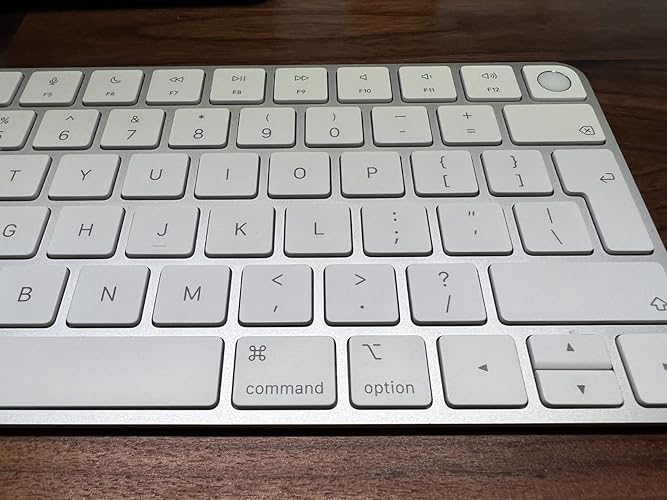 Apple Magic Keyboard with Touch ID: Bluetooth, rechargeable. Works