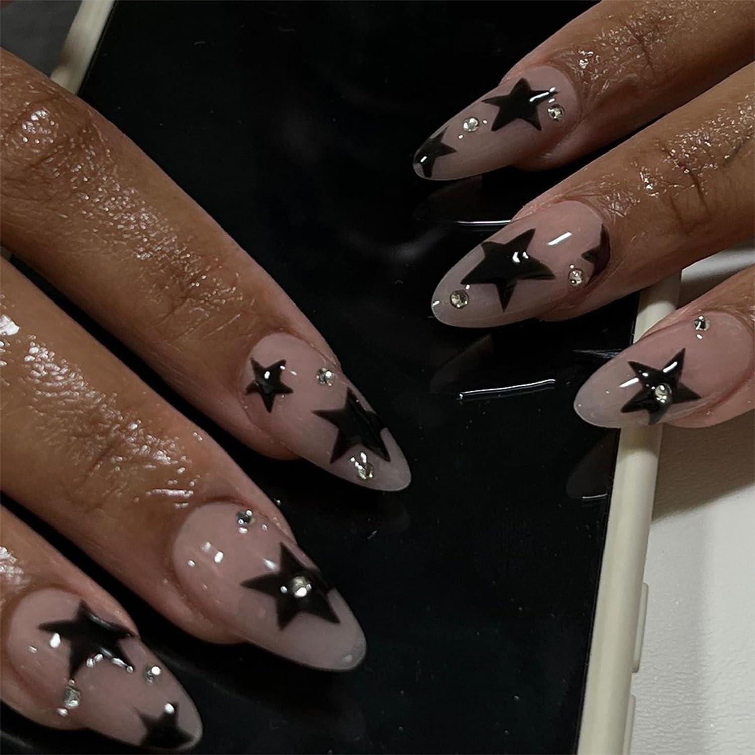 Black Star Press on Nails Medium Almond Fake Nails Nude Pink with Rhinestone Design Stick on Nails Full Cover Acrylic Nails Star False Nails Glitter