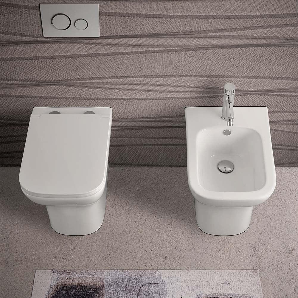 Wc singolo filomuro senza brida bianco lucido, scarico multiplo a parete o a pavimento, fissaggi inclusi, PLANA