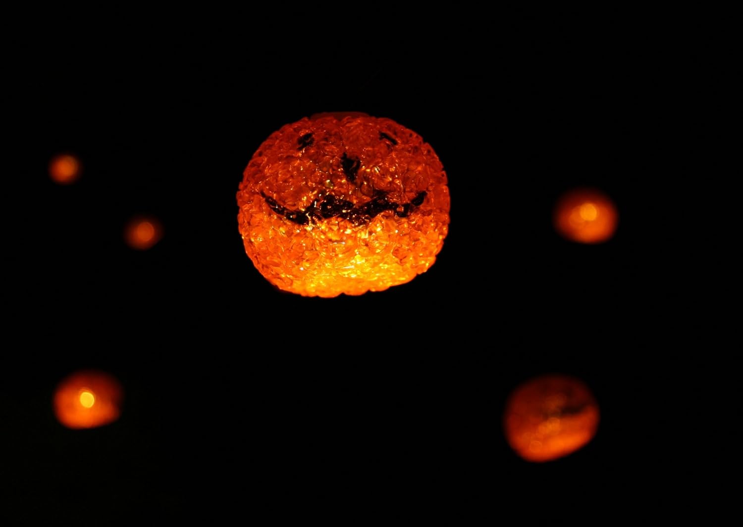 Halloween Solar String Lights - Glowing Orange Jack O' Lanterns - Set of Twelve (12) Lights