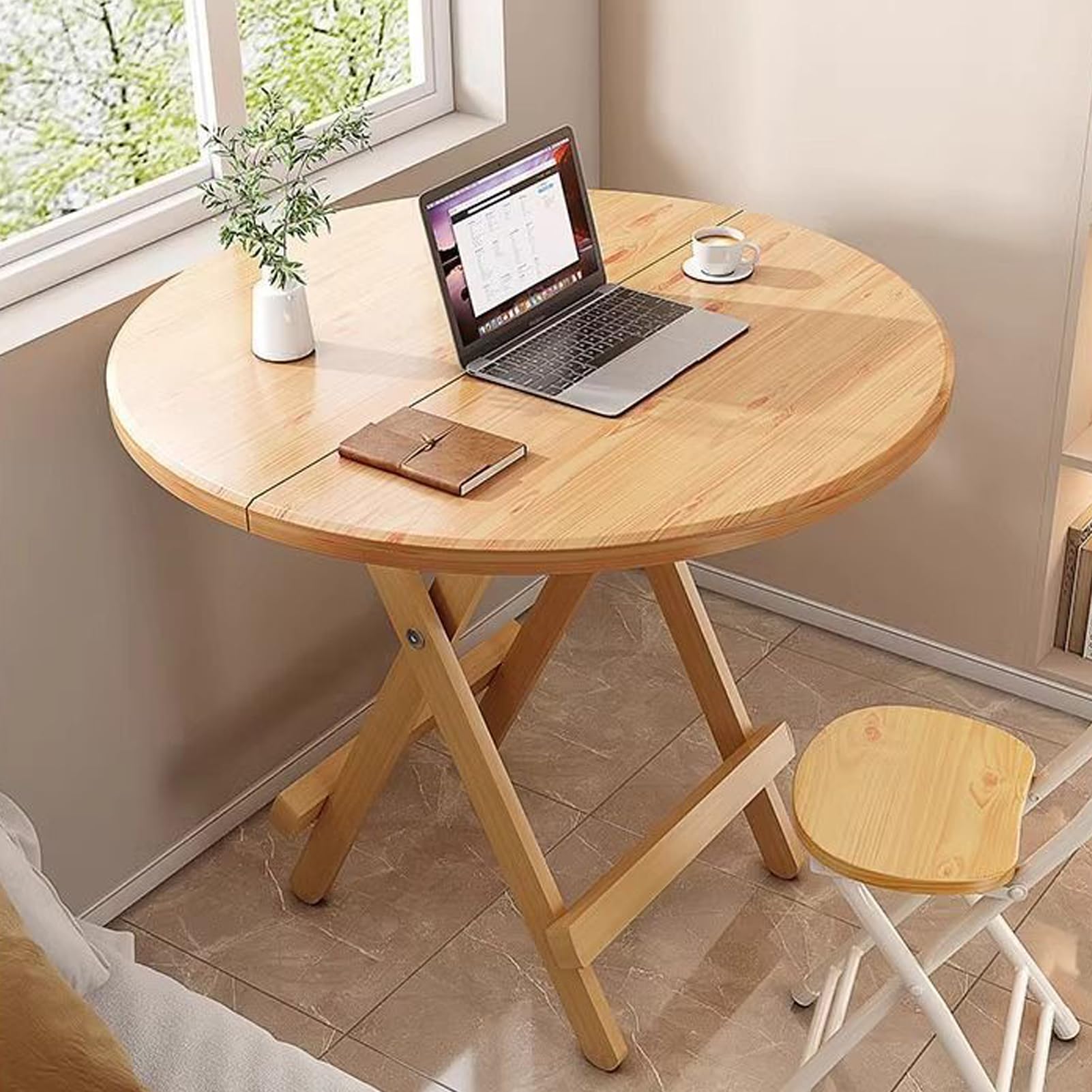 Table ronde pliable bois 70 cm pour rompre le manque de place au salon