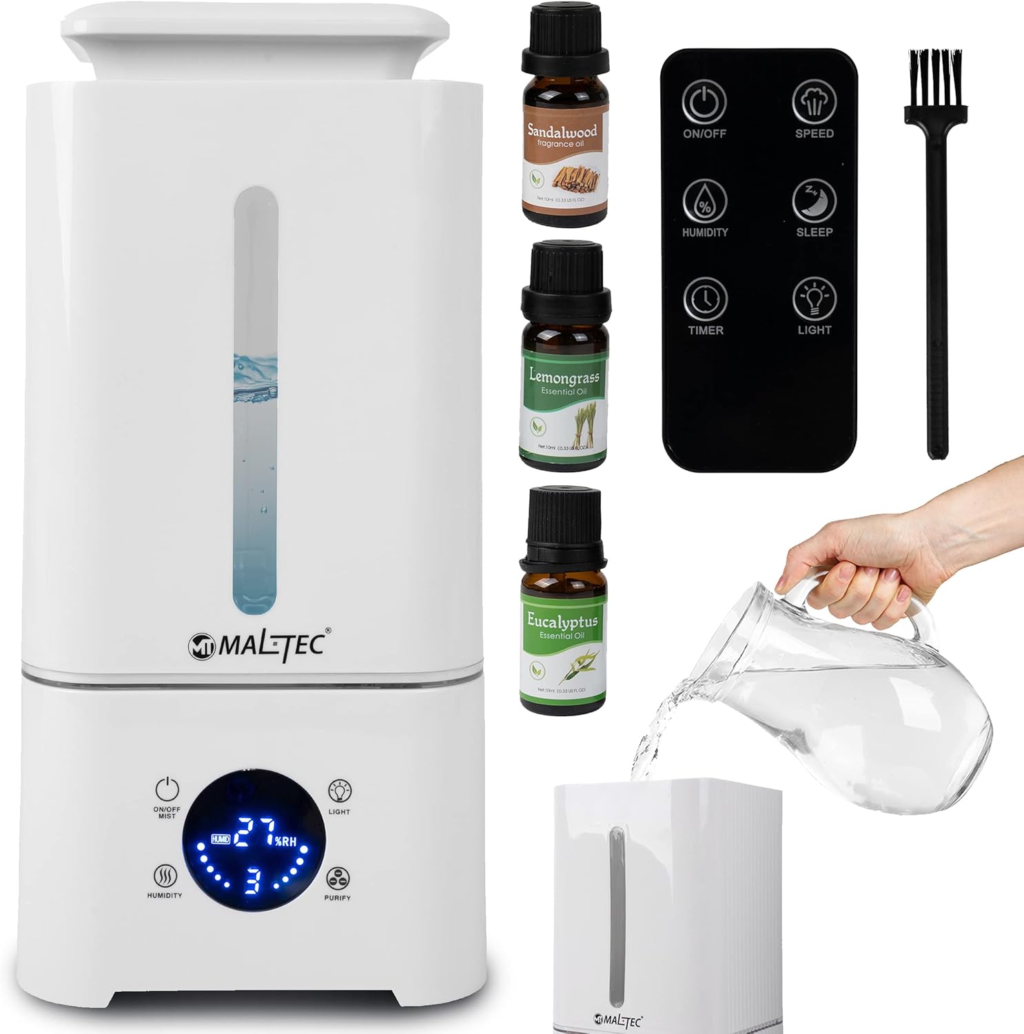 Maltec WT-3400KW humidifier with remote control, three bottles of essential oils, and a cleaning brush.