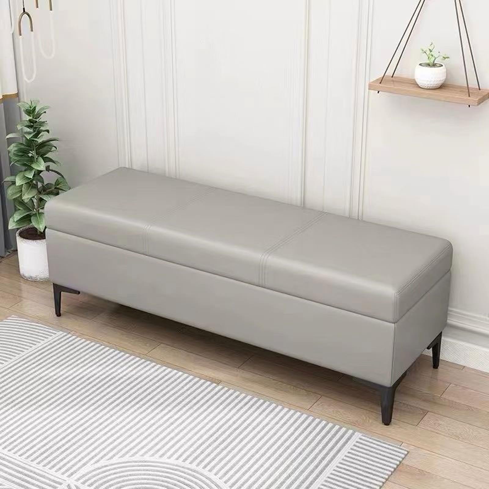 Banc ottoman en cuir pour aménager un bout de lit chaleureux