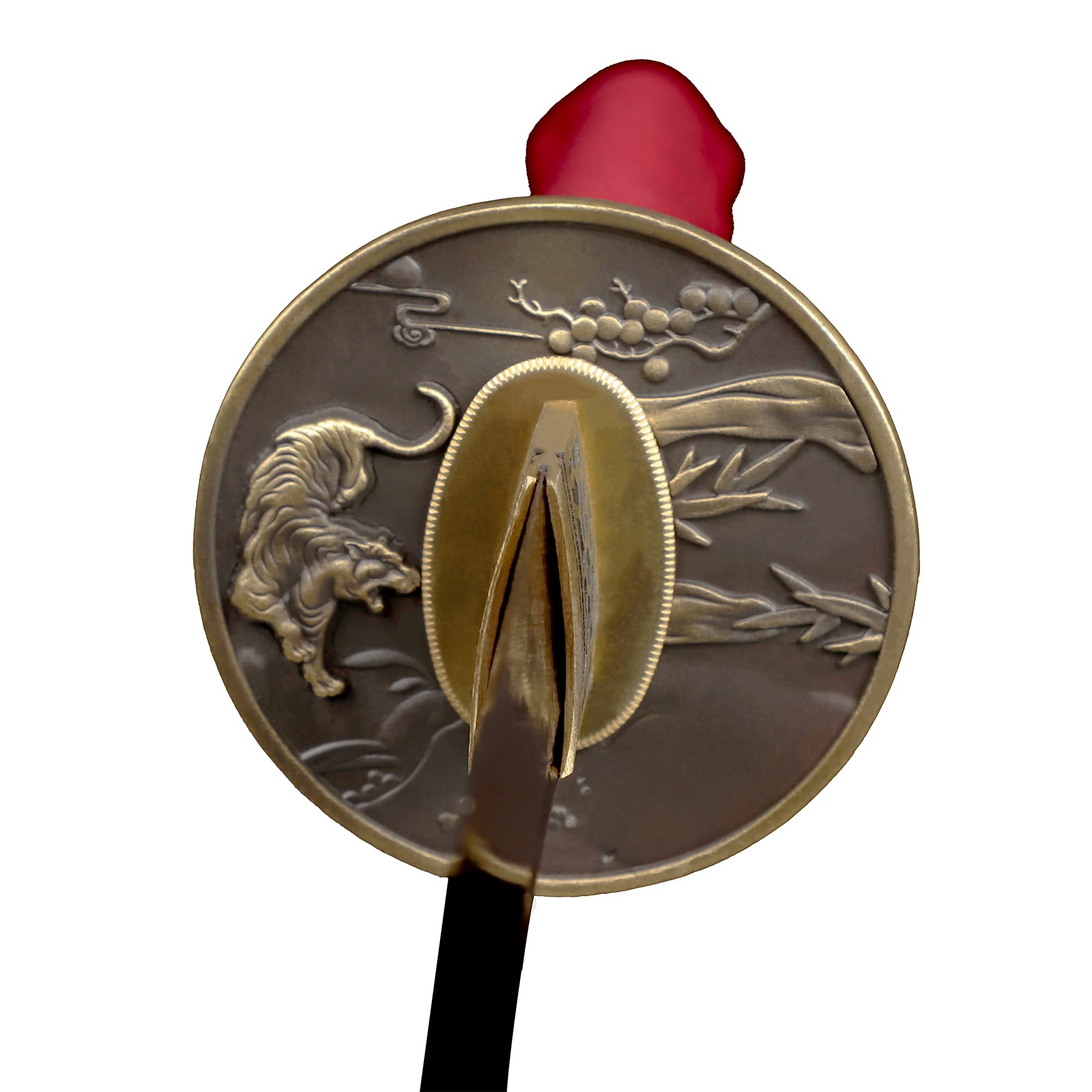 Close-up of the Katana sword guard (Tsuba) with tiger and bamboo design