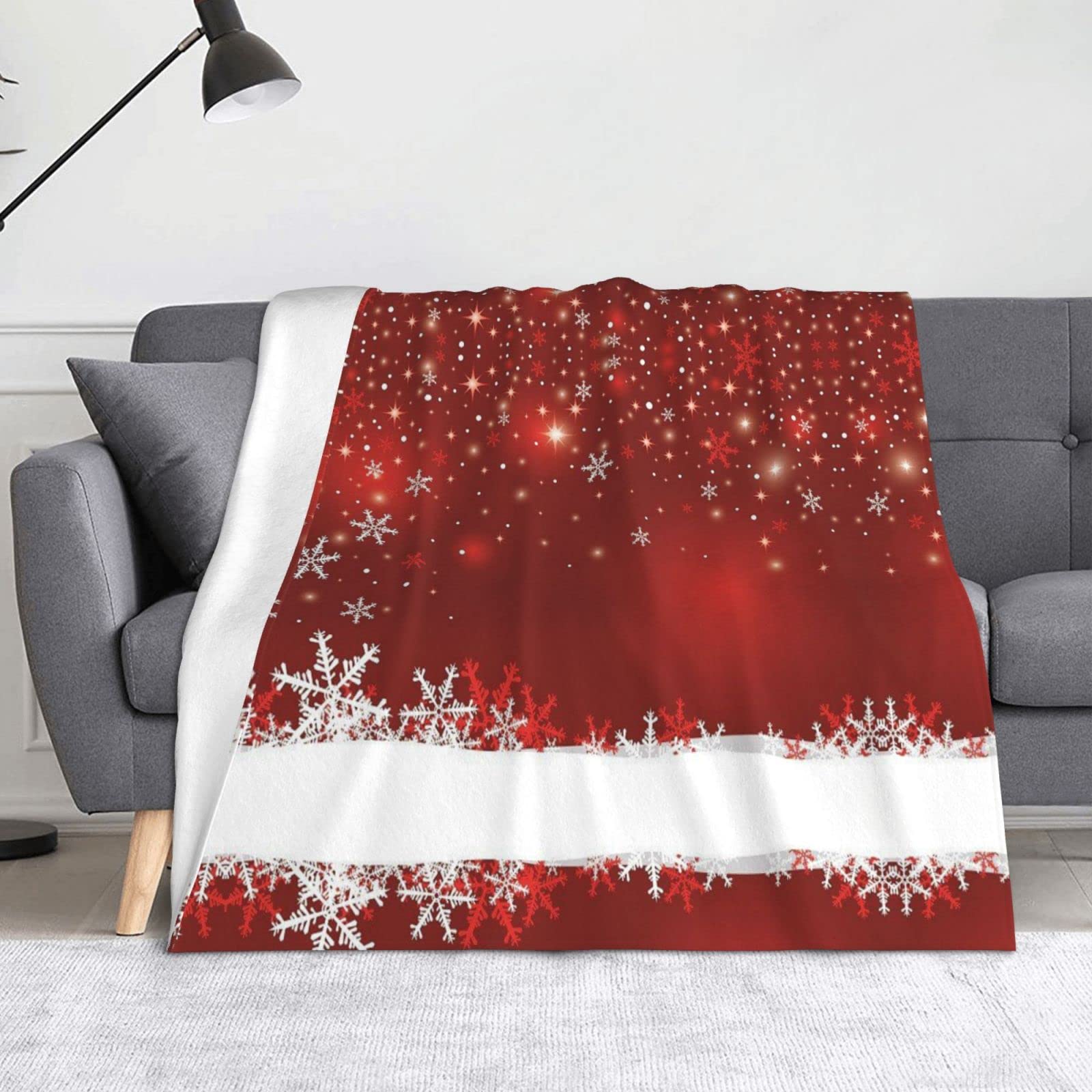 Couverture de Noël en flanelle pour stopper le froid sur le canapé ou en voyage
