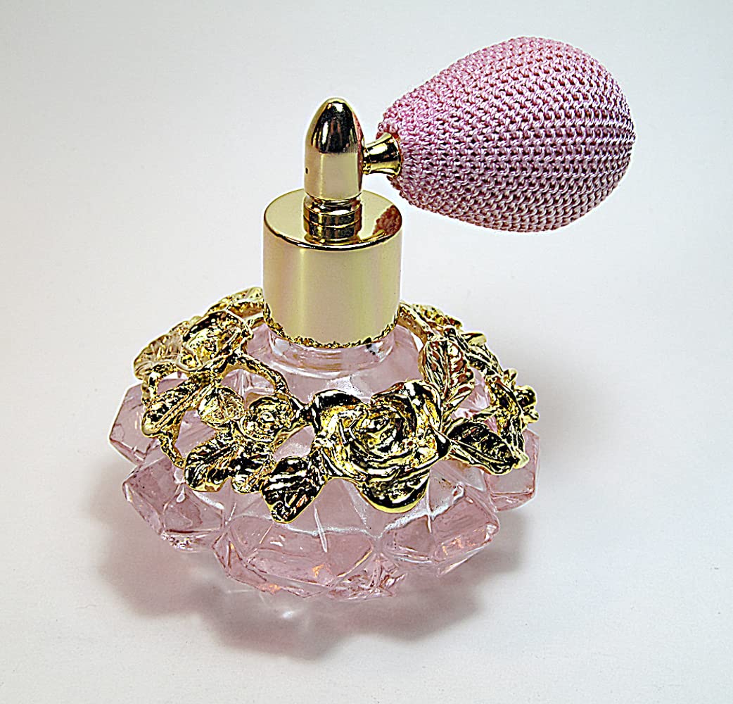 Alice-Aliya Refillable Pink glass perfume bottle with pink bulb spray attachment.