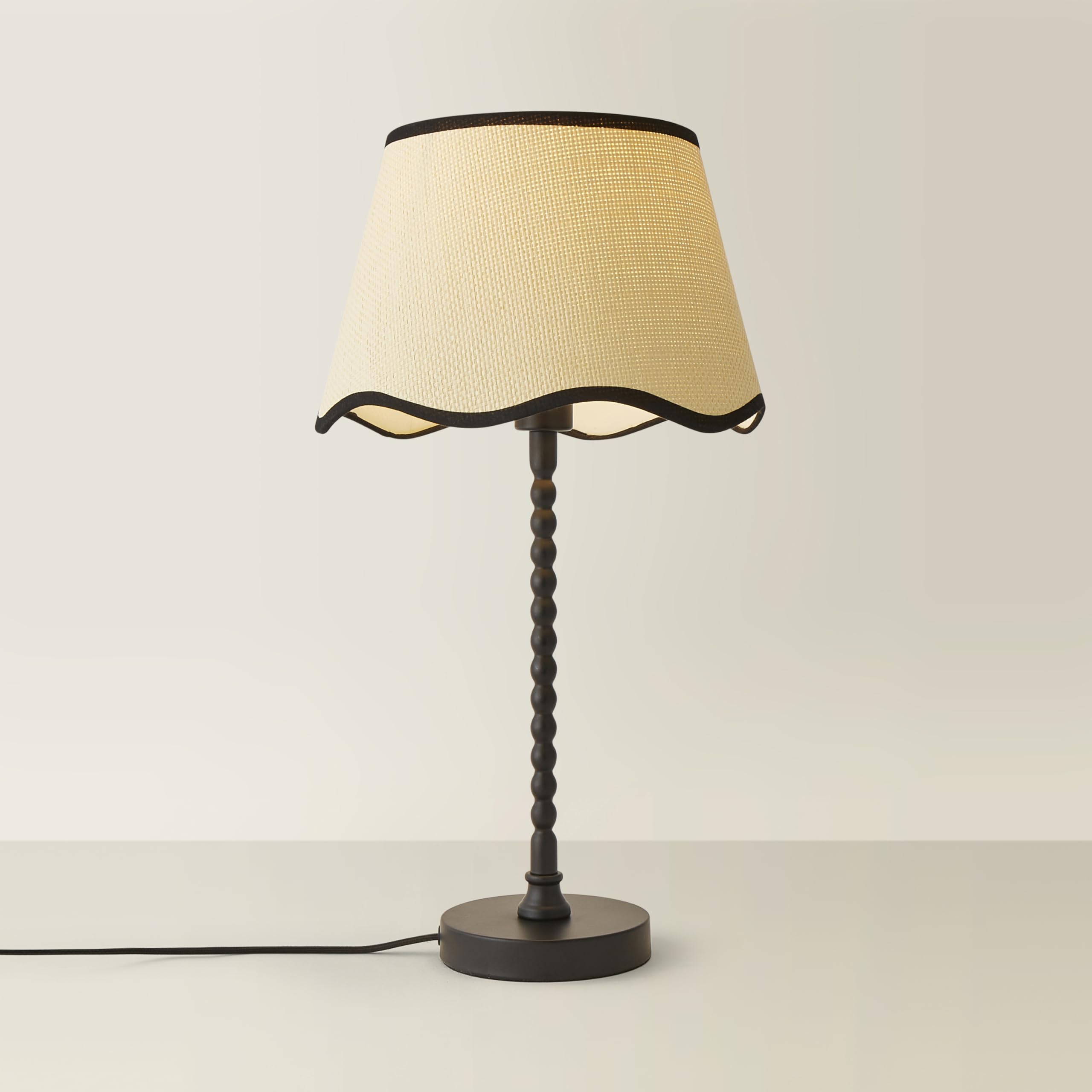 Valuelights Maeve Natural Scallop Black Trim Drum Shade Matte Black Bobbin Bobble Table Lamp from B&Q