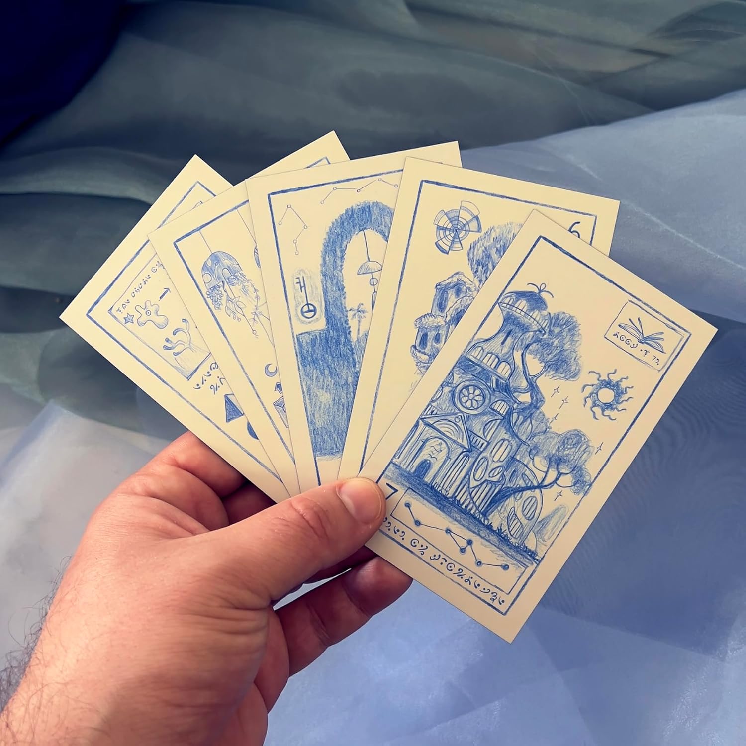 Prisma Visions The Cerulean Sequence Numerology Oracle Deck with hardcover Guidebook, Unique Hand-Drawn Style and Keepsake Box. Decode The Cipher and Uncover The Story Behind The Cards.