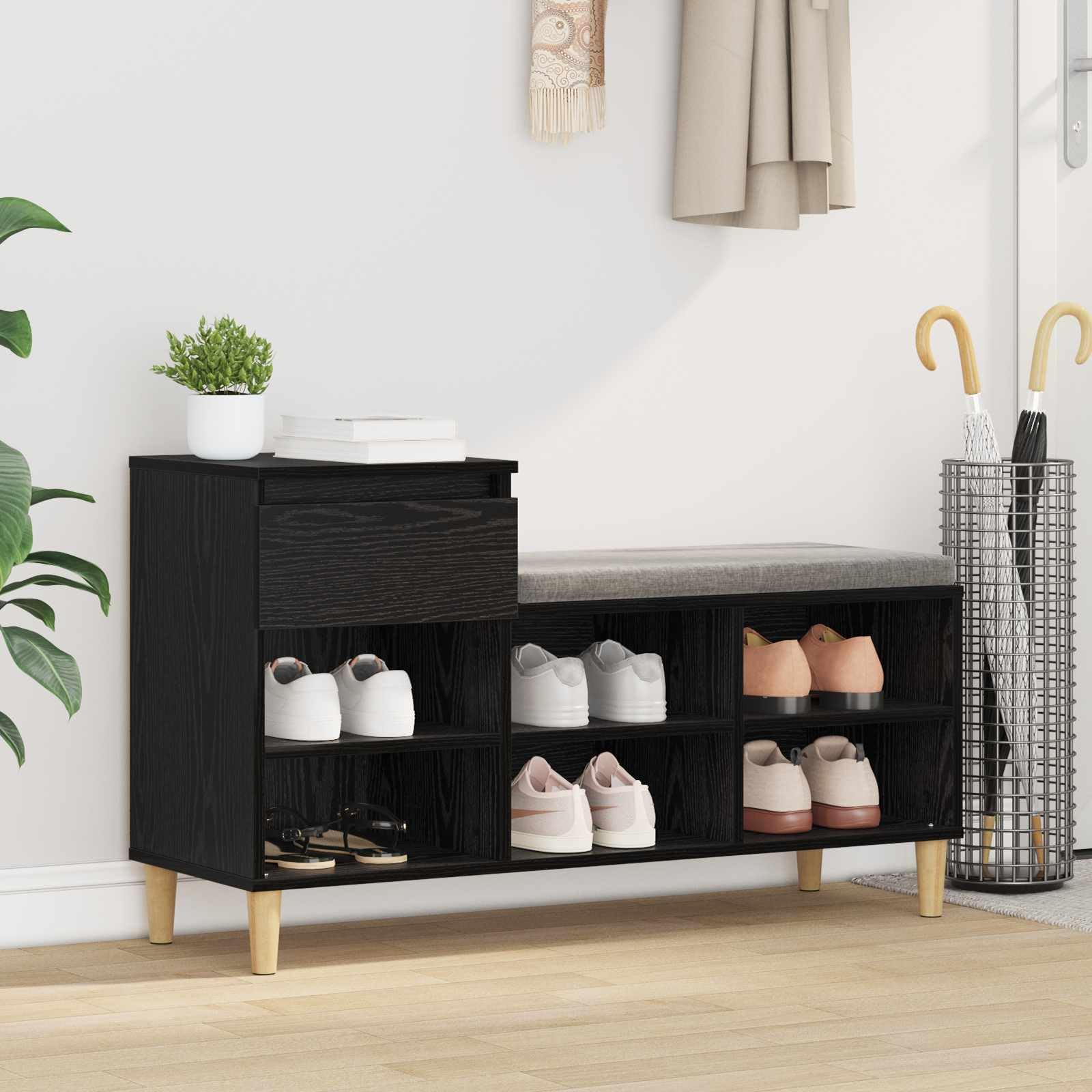 Banc à chaussures gain de place noir et bois pour l'organisation du couloir