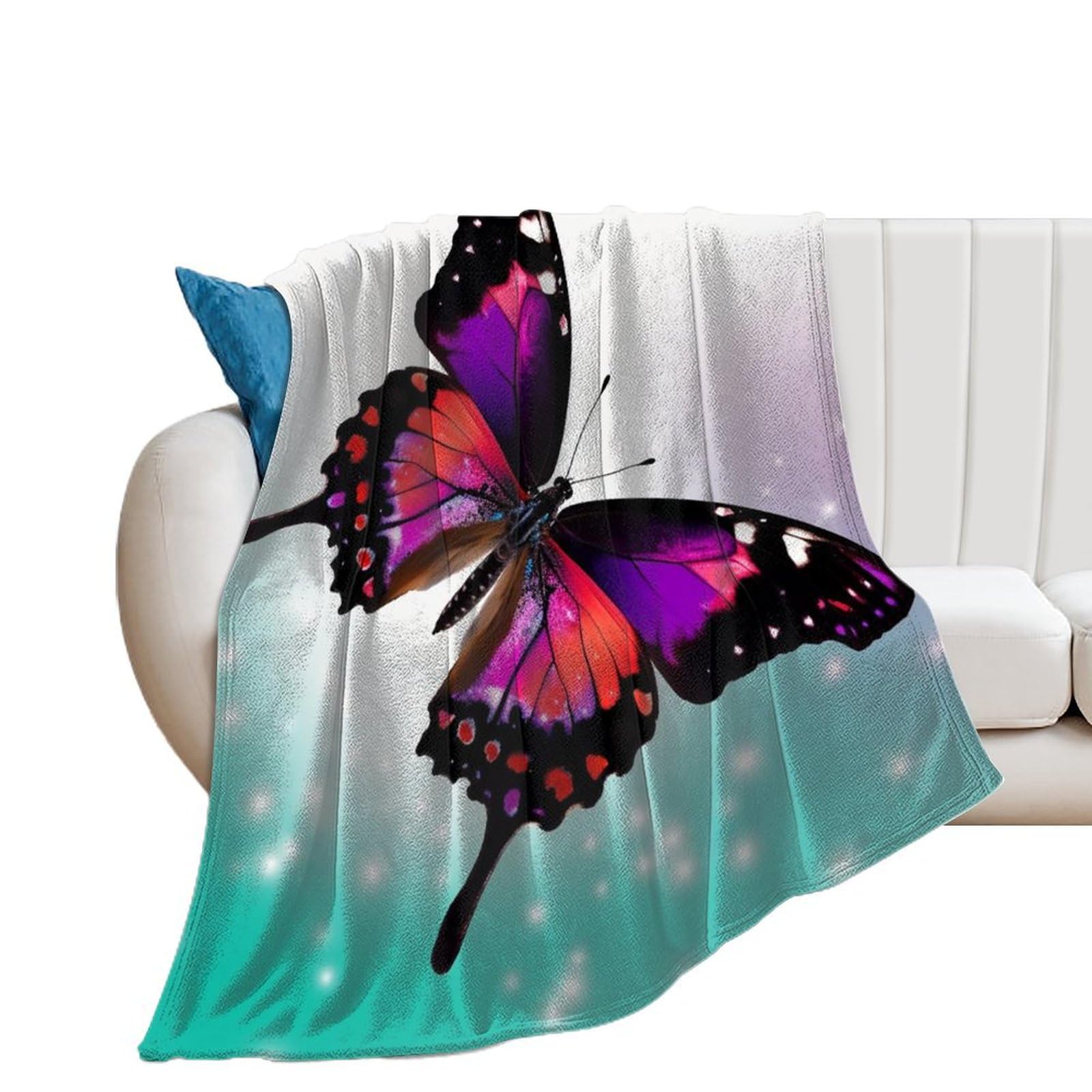 Plaid flanelle papillon pour cocooning sur le canapé du salon