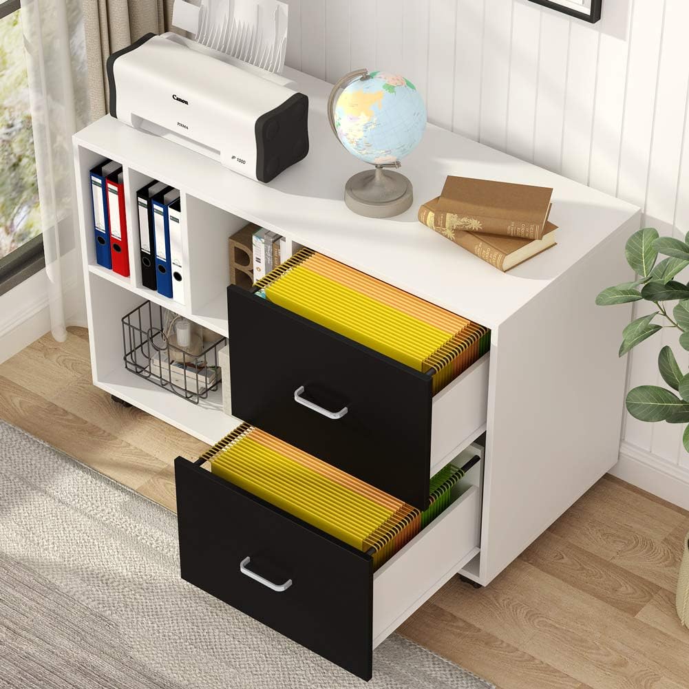 Two open file drawers filled with hanging legal-size folders in an office setting.