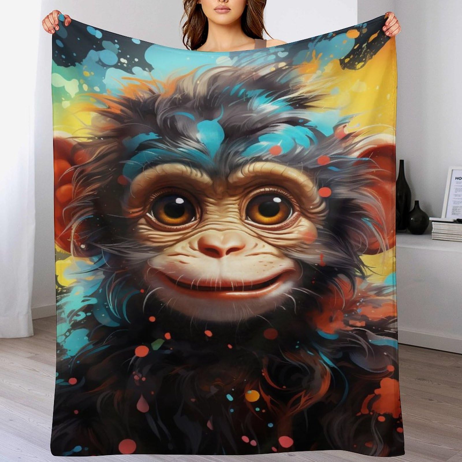 Manta de forro polar de mono para tardes de peli y sofa en casa