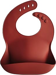 Mushie Baby Silicone Bib | Adjustable Fit Waterproof Bibs | Easy Wipe Baby Feeding Bibs | 4 Adjustable Sizes with Deep Front Pockets | 100% BPA and Phthalate Free