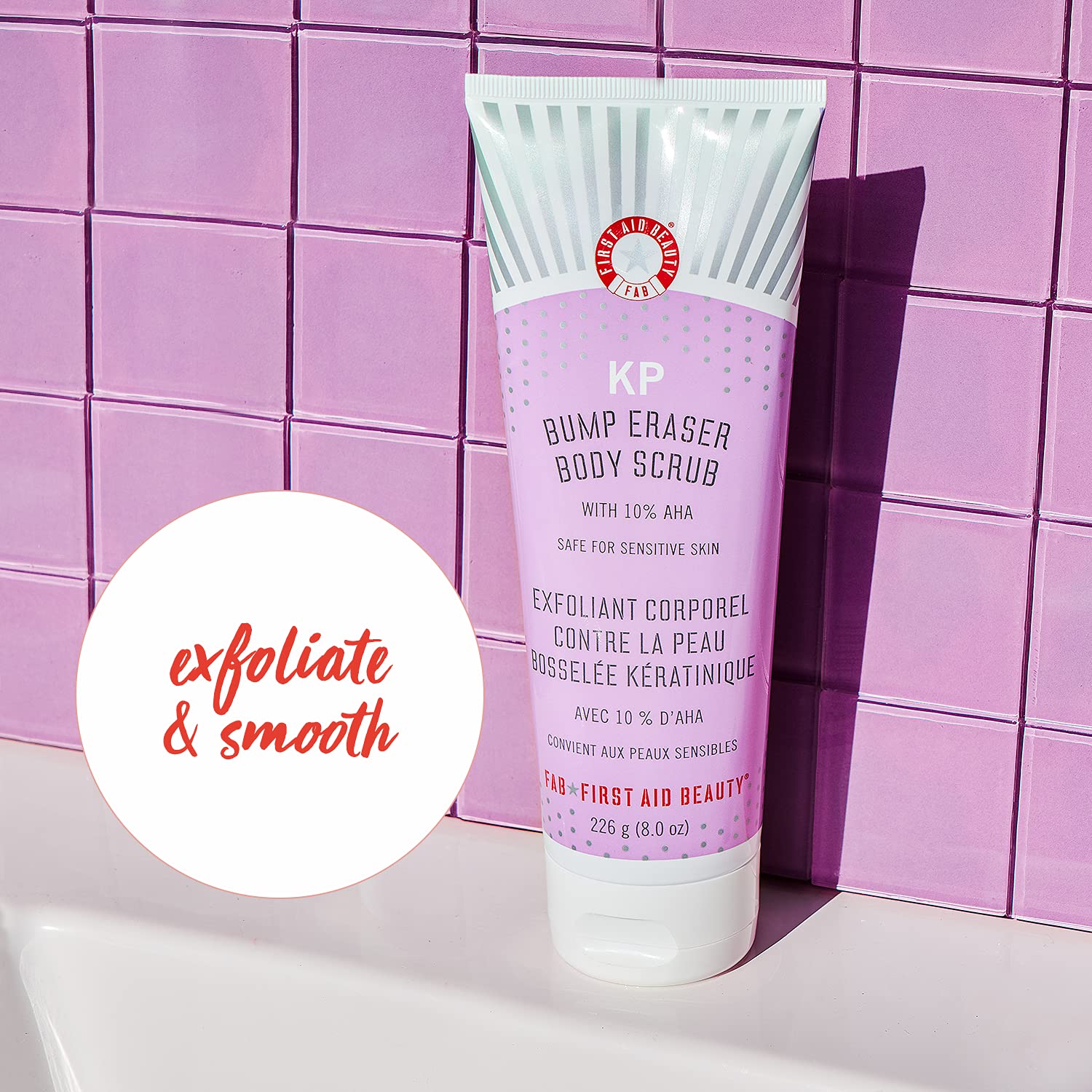 First Aid Beauty Bundle: KP Bump Eraser Body Scrub with 10% AHA – 8oz. – and Deluxe Mini Ultra Repair Cream Intense Hydration Moisturizer – 1 oz.