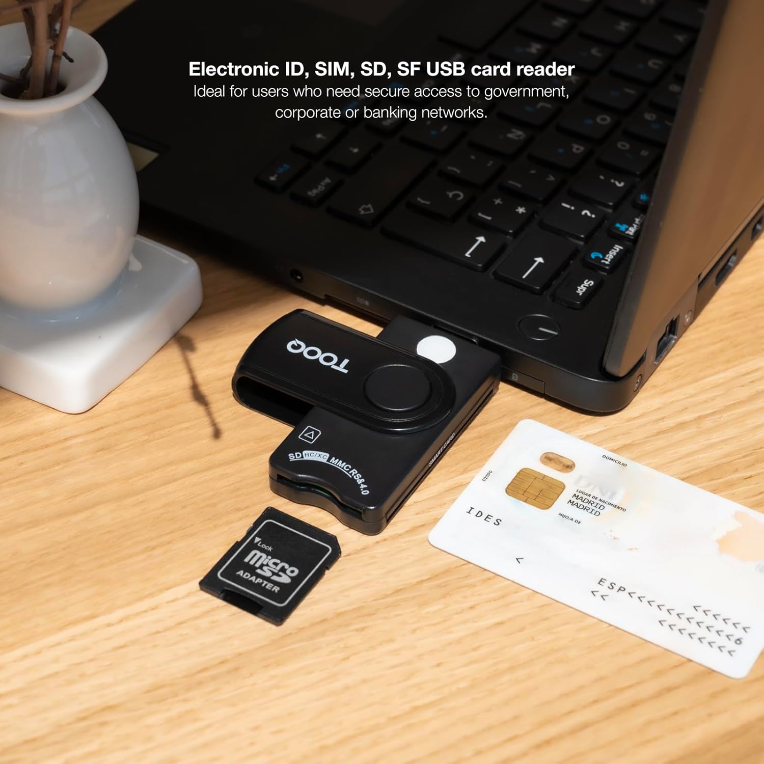 TOOQ TQR-3012B Smart Card Reader connected to a laptop, with an electronic ID card and a microSD card adapter next to it.