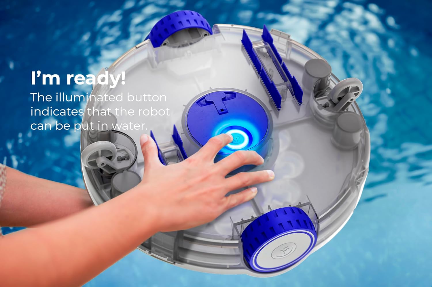 Hand pressing the illuminated button on the Gre RBR75 robotic pool cleaner