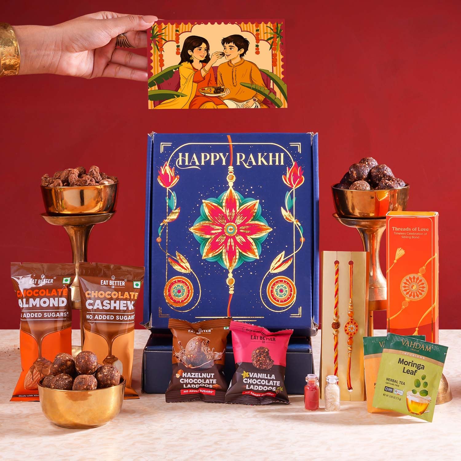 EAT BETTER CO Bandhan - 6-Item Rakhi Gift For Brother, Chocolate Coated Almonds, Hazelnut Dry-Fruit Laddoos, Red-Gold Rakhi | Rakhi Gift Combo Set, Rakhi Gift For Brother On Raksha Bandhan, 290 Grams-image-36