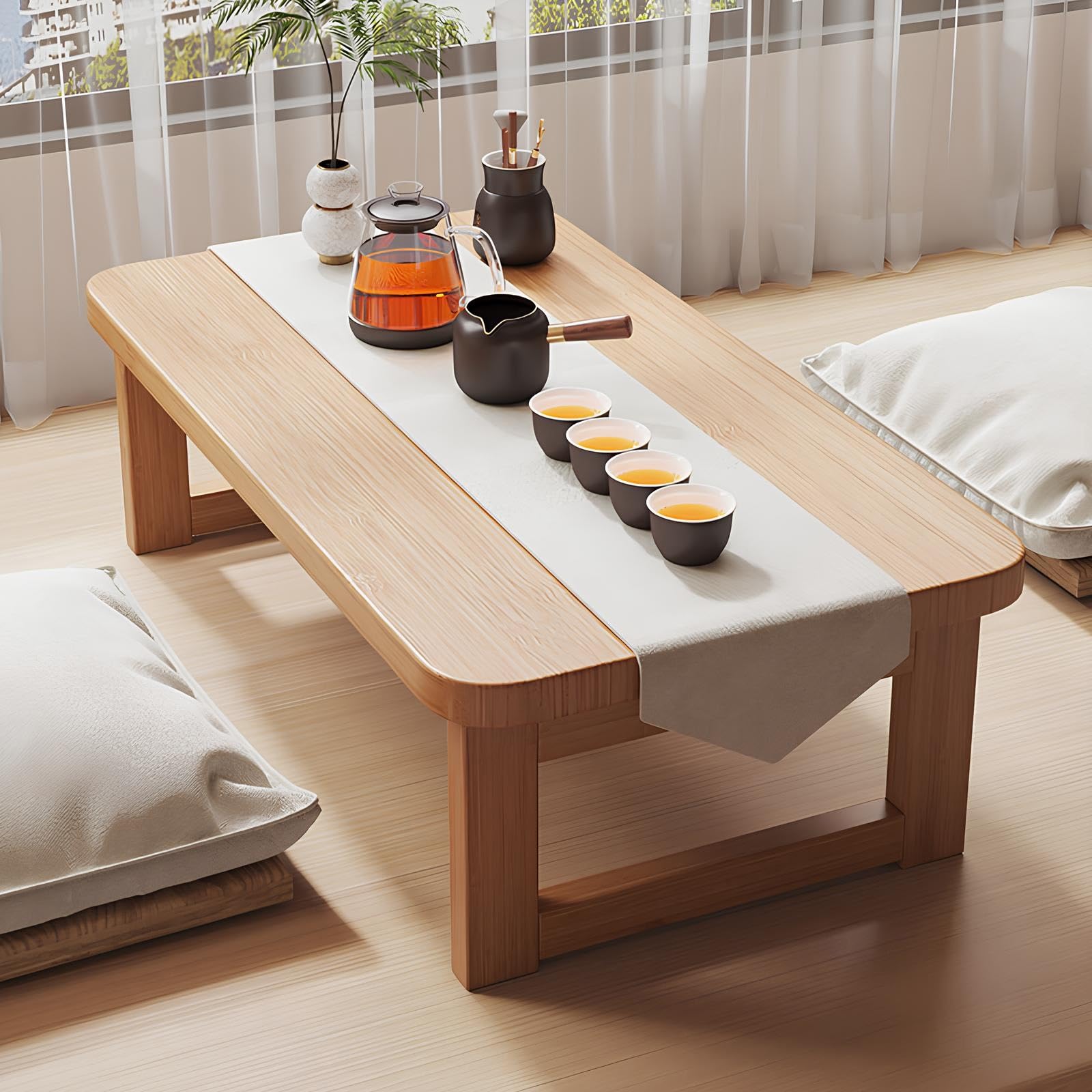 Table basse pliable pour s'asseoir au sol et optimiser les petits salons