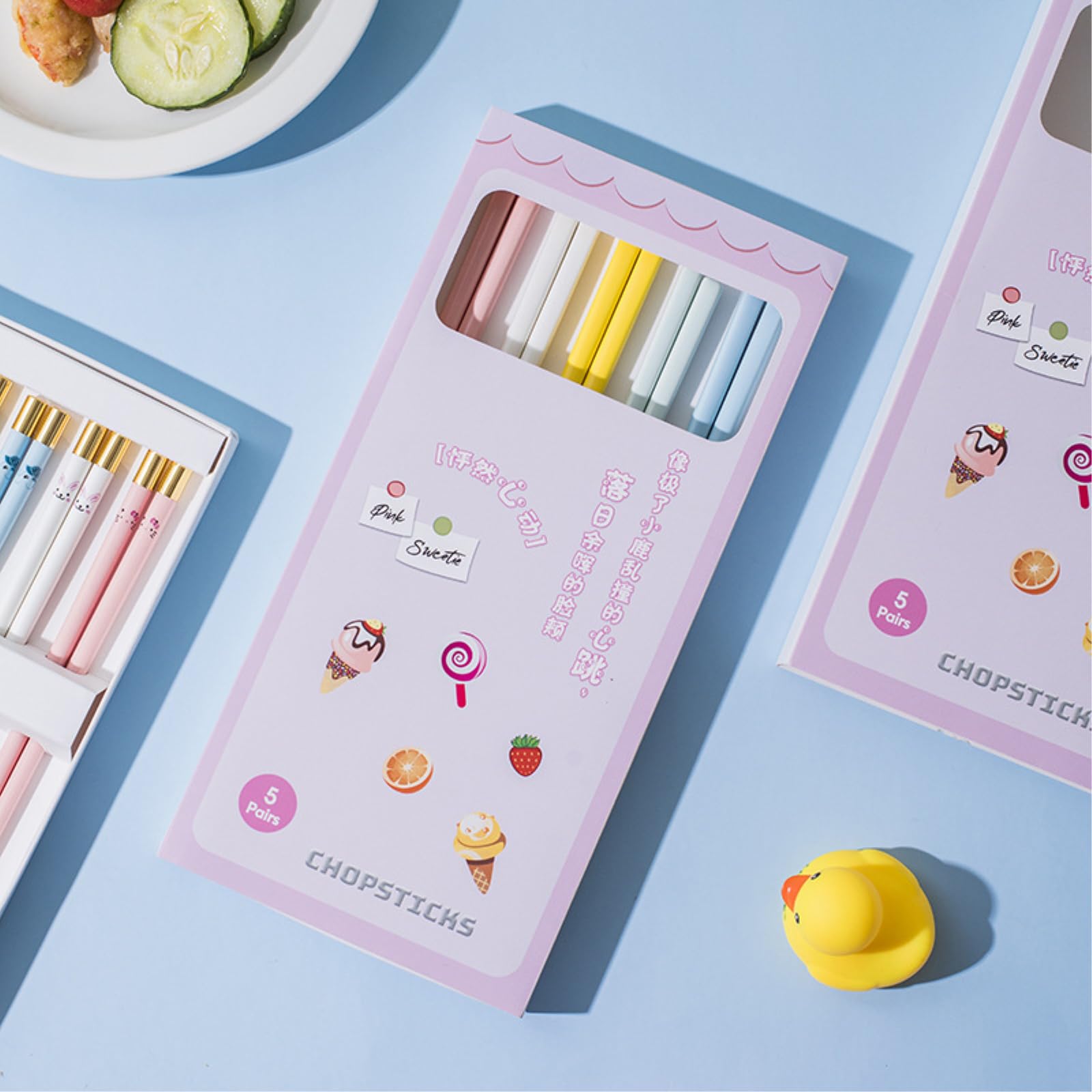 Lot de 2 paires de baguettes en céramique colorées, tête de cere et vaisselle de personnage - Tête dorée
