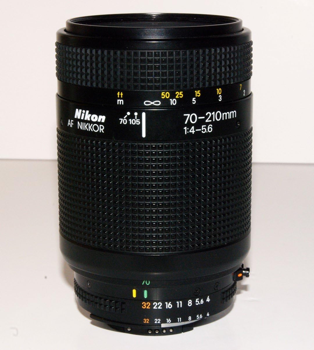 Nikon AF Nikkor 70-210mm 1:4-5.6 Zoom Lens with focal length and aperture markings