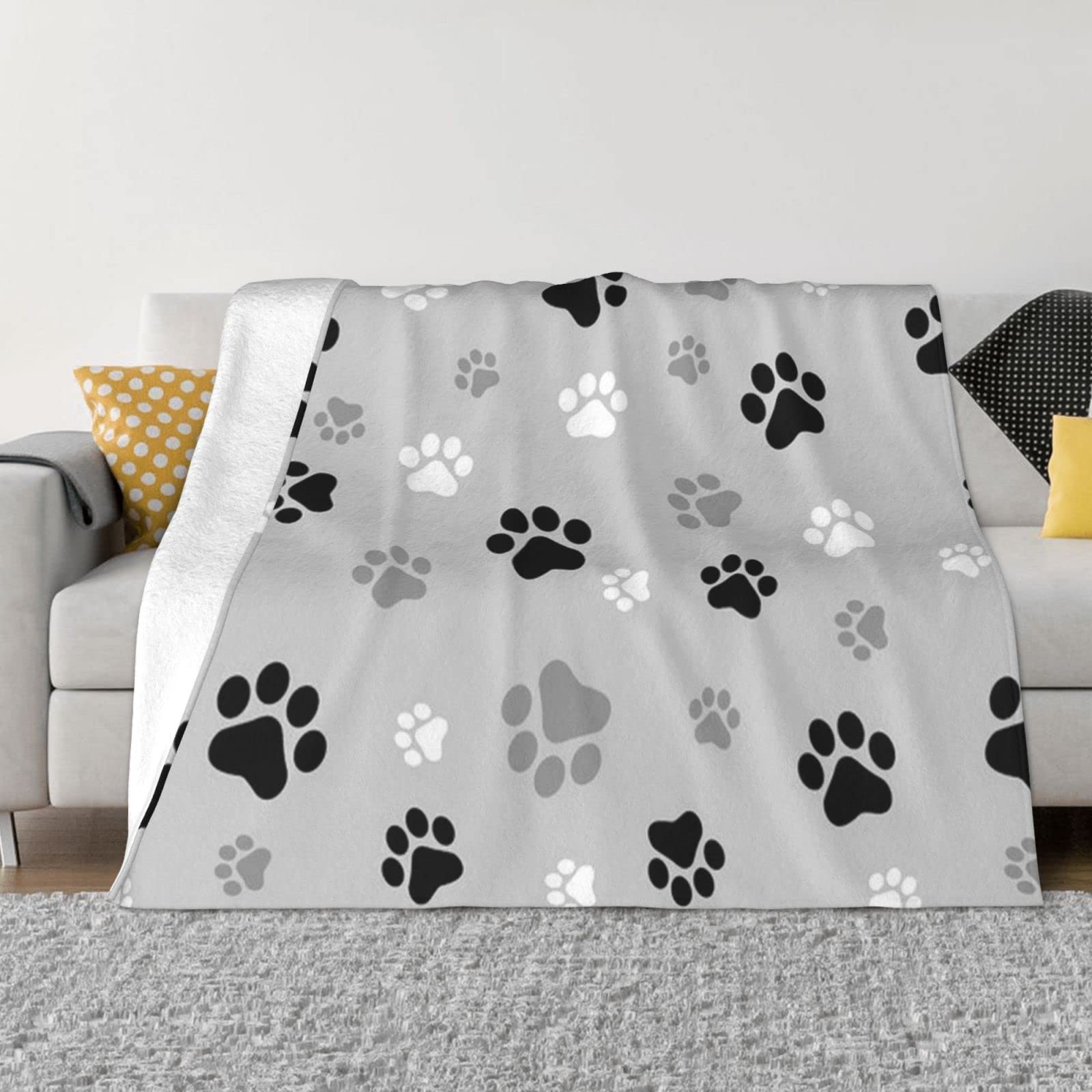 Couverture douce en flanelle haut de gamme au motif de pattes d'animaux