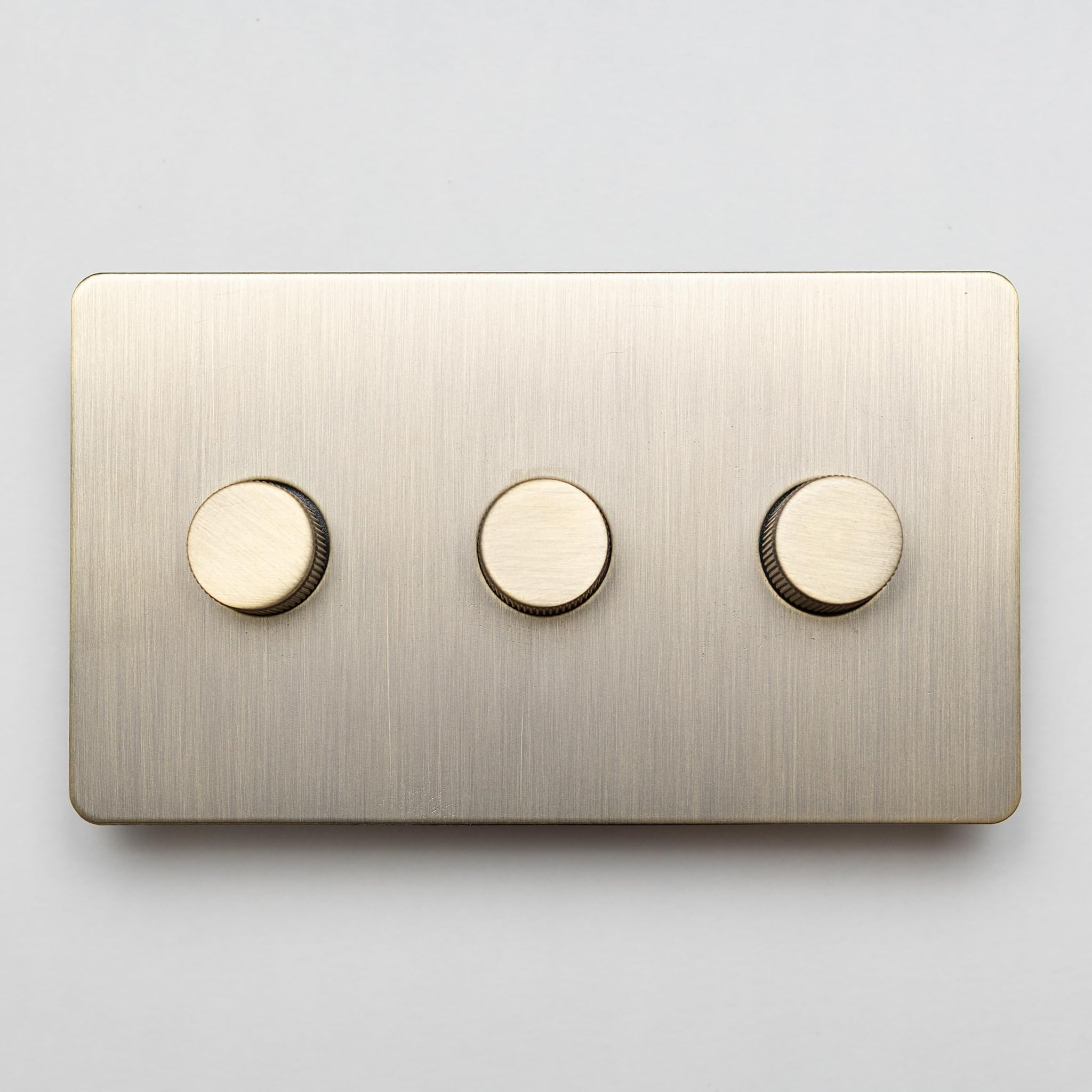 Antique Brass Straight Knurled Switches and Sockets | Screwless Front Plate (3 Gang Dimmer - 2 way)