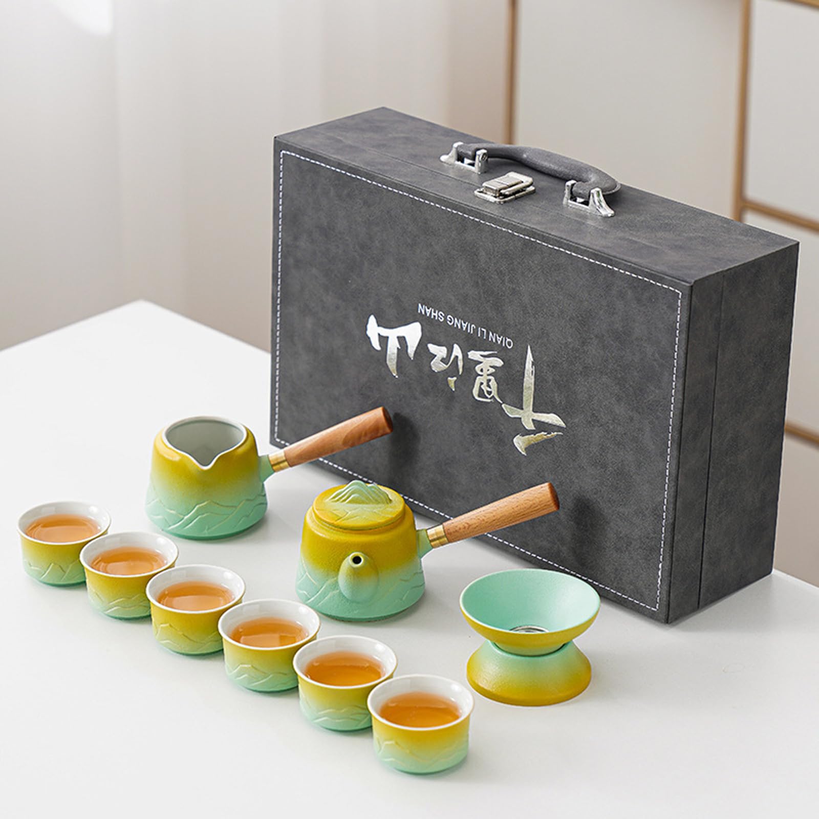 KEYDUACU Service à thé 10 pièces en céramique, y compris 1 théière, 6 tasses à thé, 1 tasse à thé, 1 passoire à thé, 1 sac portable, service à thé kung fu chinois, peut être utilisé à la maison,