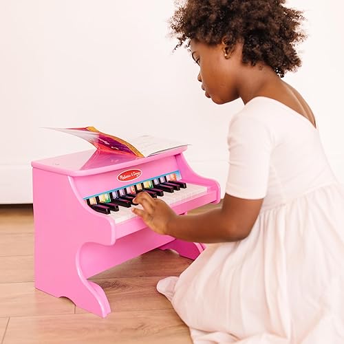 Miniatura 7 de Melissa  Doug Piano rosa para aprender a tocar con 25 teclas y canciones codificadas por colores