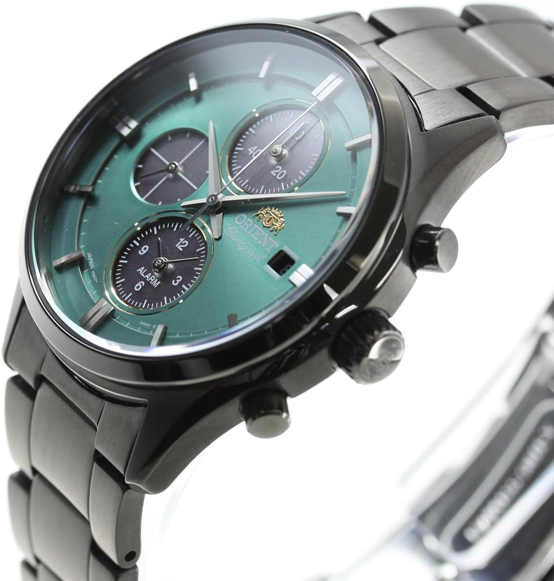 Vinklet view of the watch face showing chronograph sub-dials and alarm sub-dial