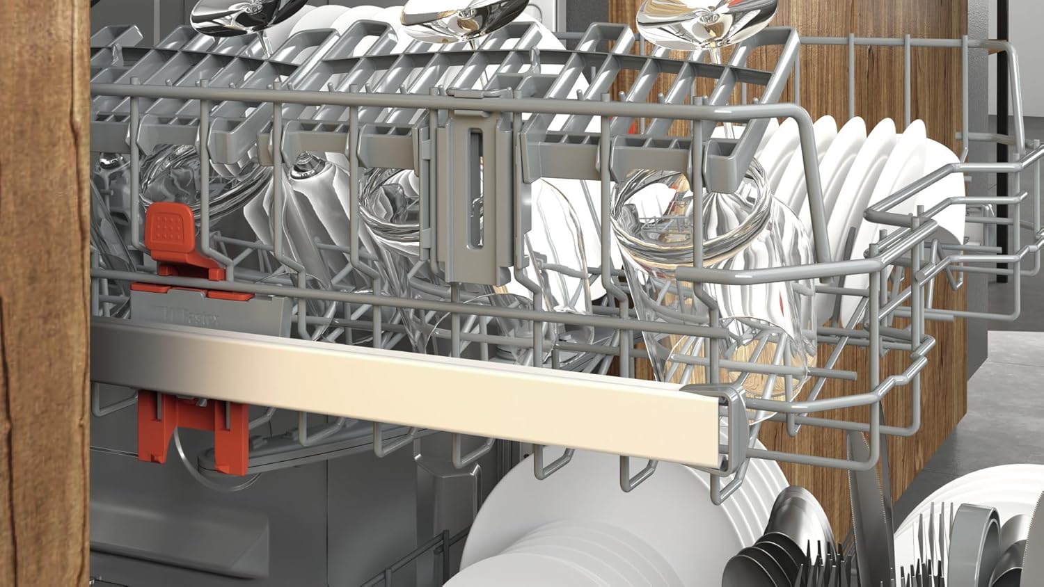 Close-up of the upper basket of the Hotpoint Ariston H2I HD526 AS dishwasher, loaded with glasses and cups.