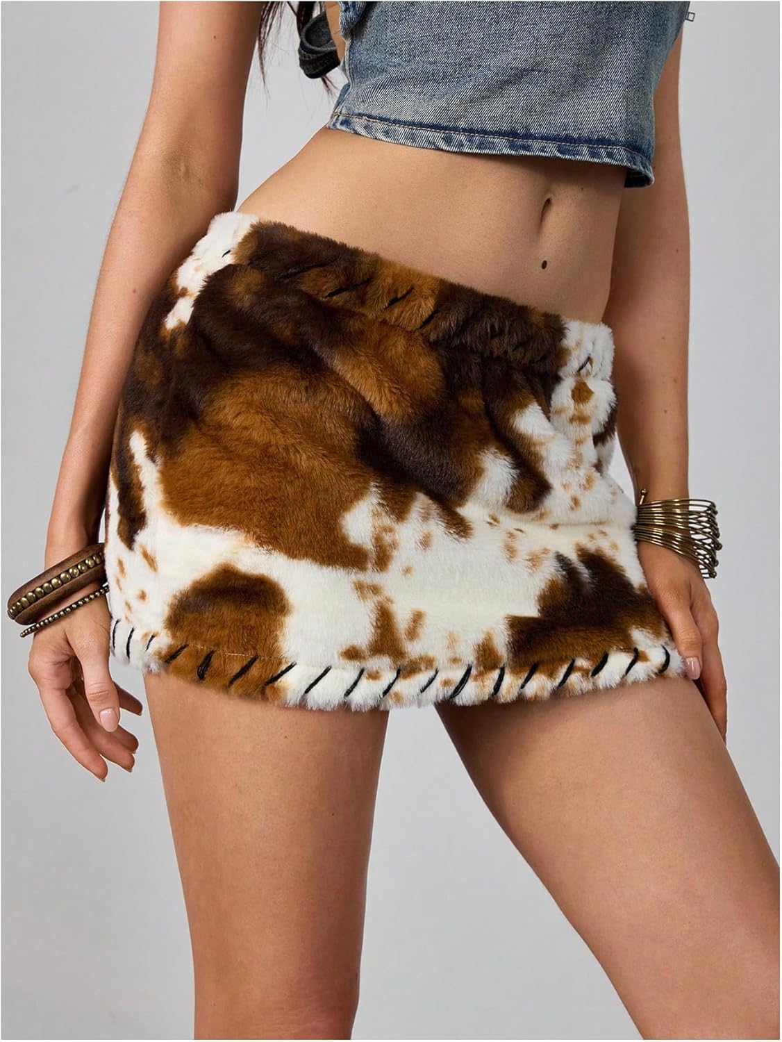 MakeMeChic Women's Cow Print Fuzzy Mini Skirt Bodycon Low Waisted Cowboy Chic Outfits - Image 2