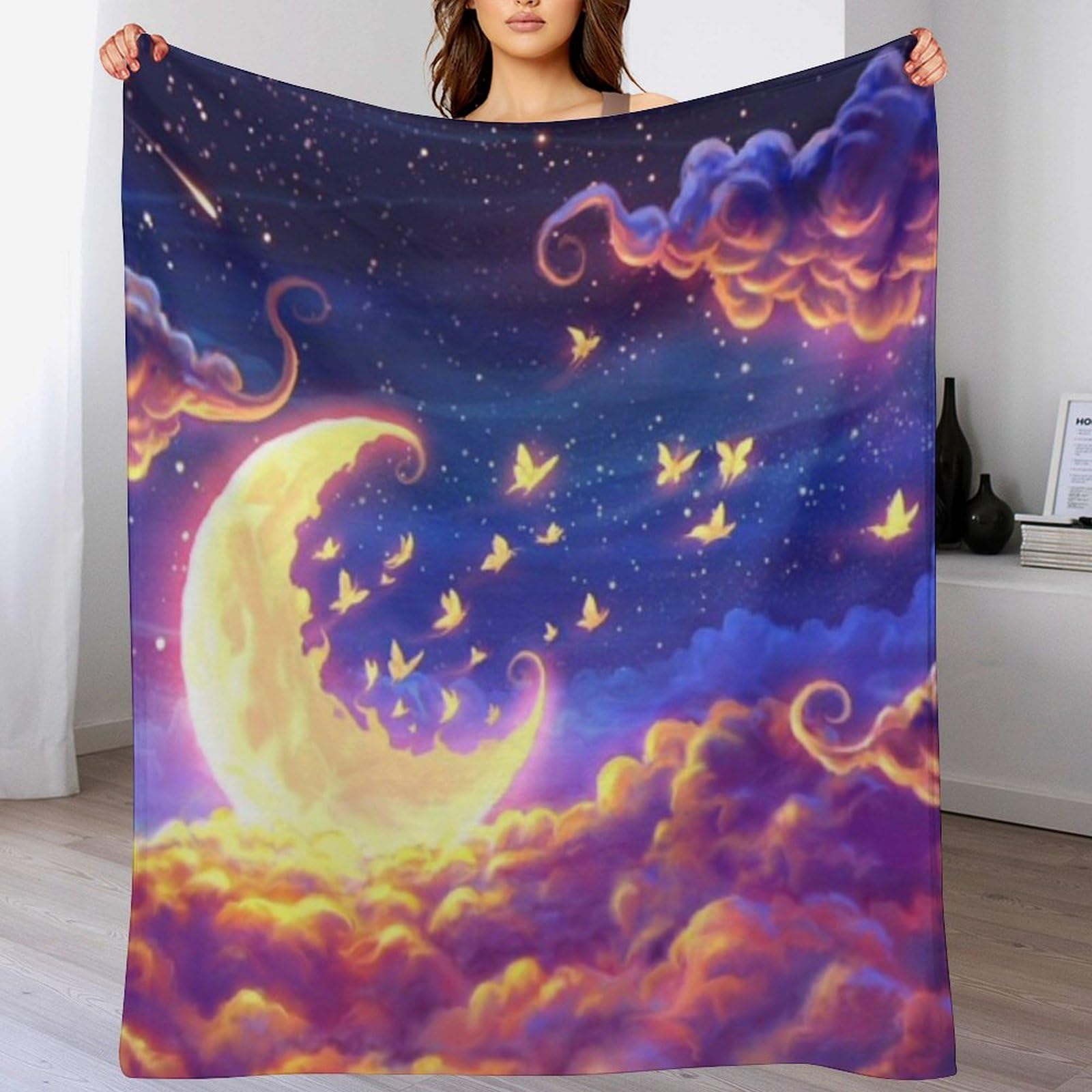 Couverture polaire nuit étoilée pour réchauffer vos soirées cinéma sur le canapé du salon