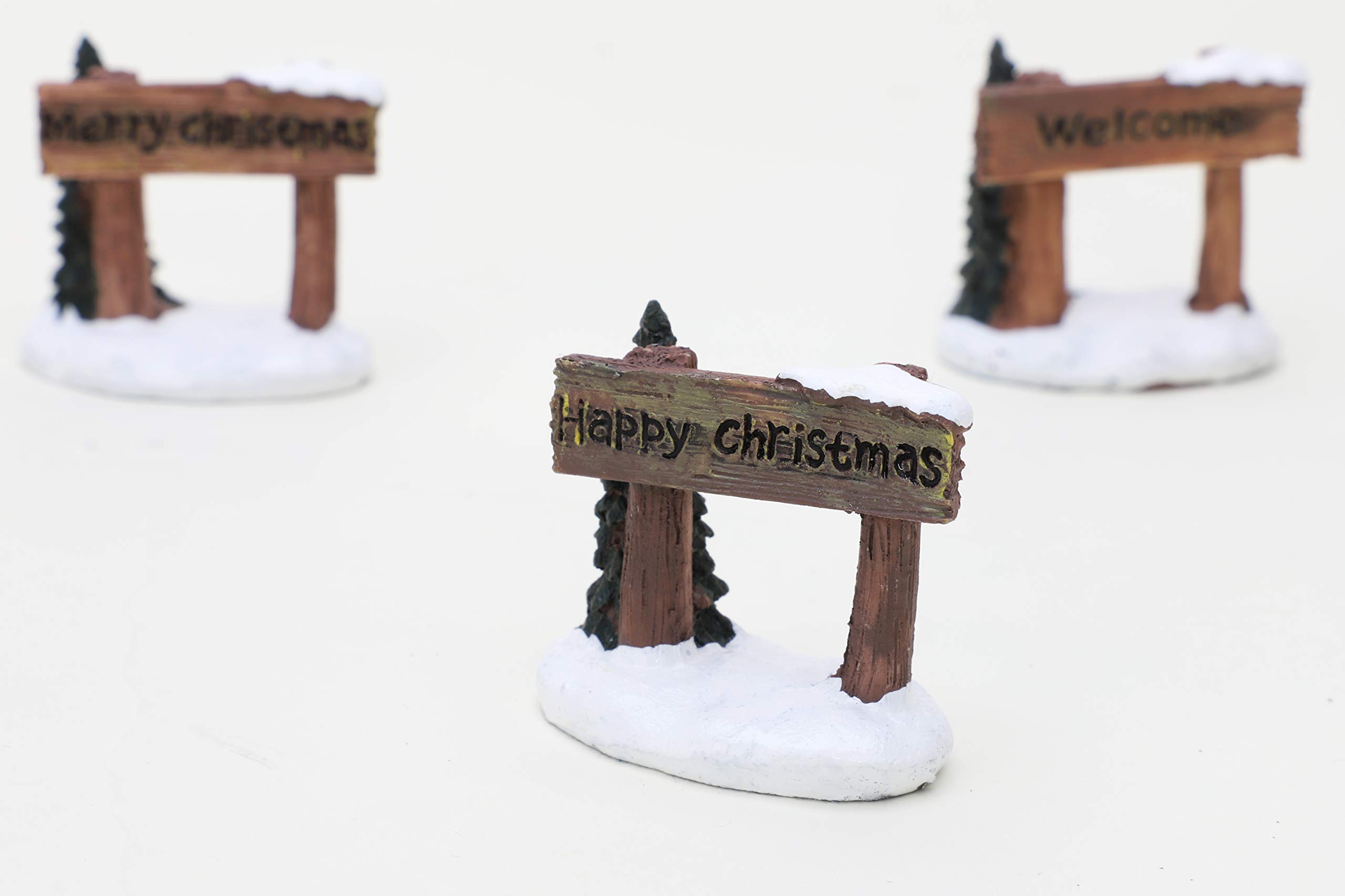 Villaggio natalizio in resina 43x24 cm con pista di pattinaggio in