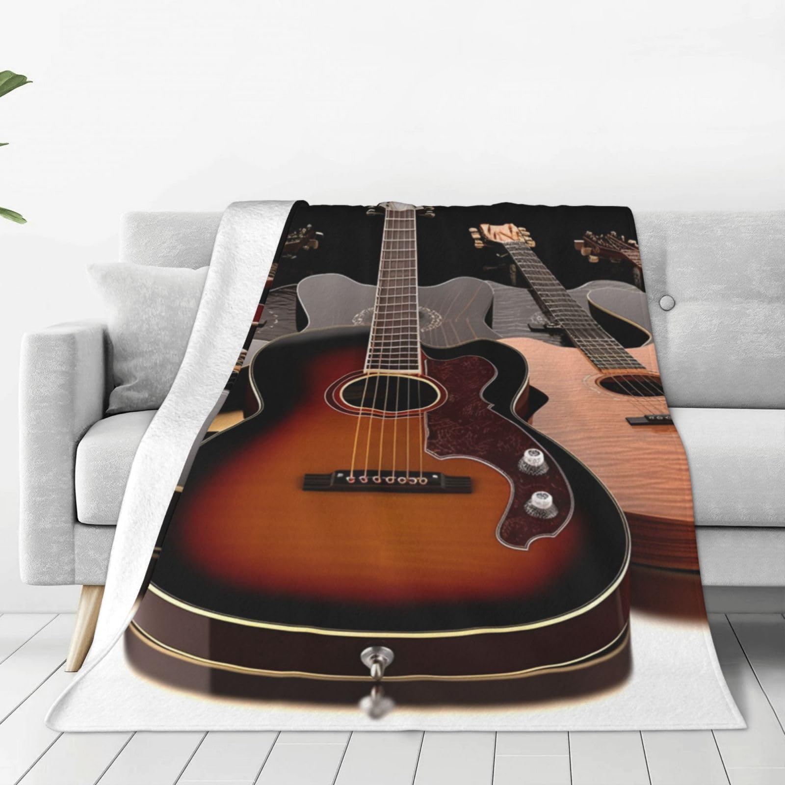 Couverture guitare micro polaire contre le froid au bureau