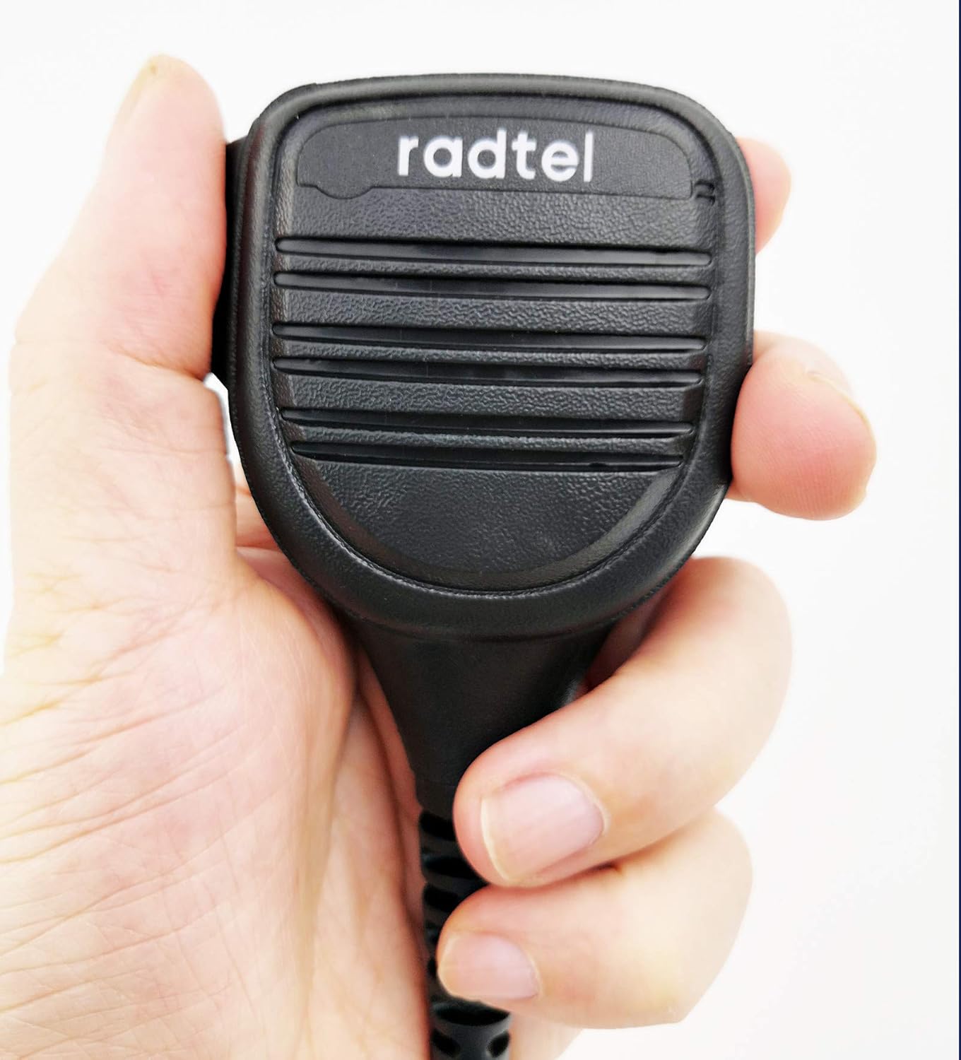 Radtel speaker microphone held in a hand