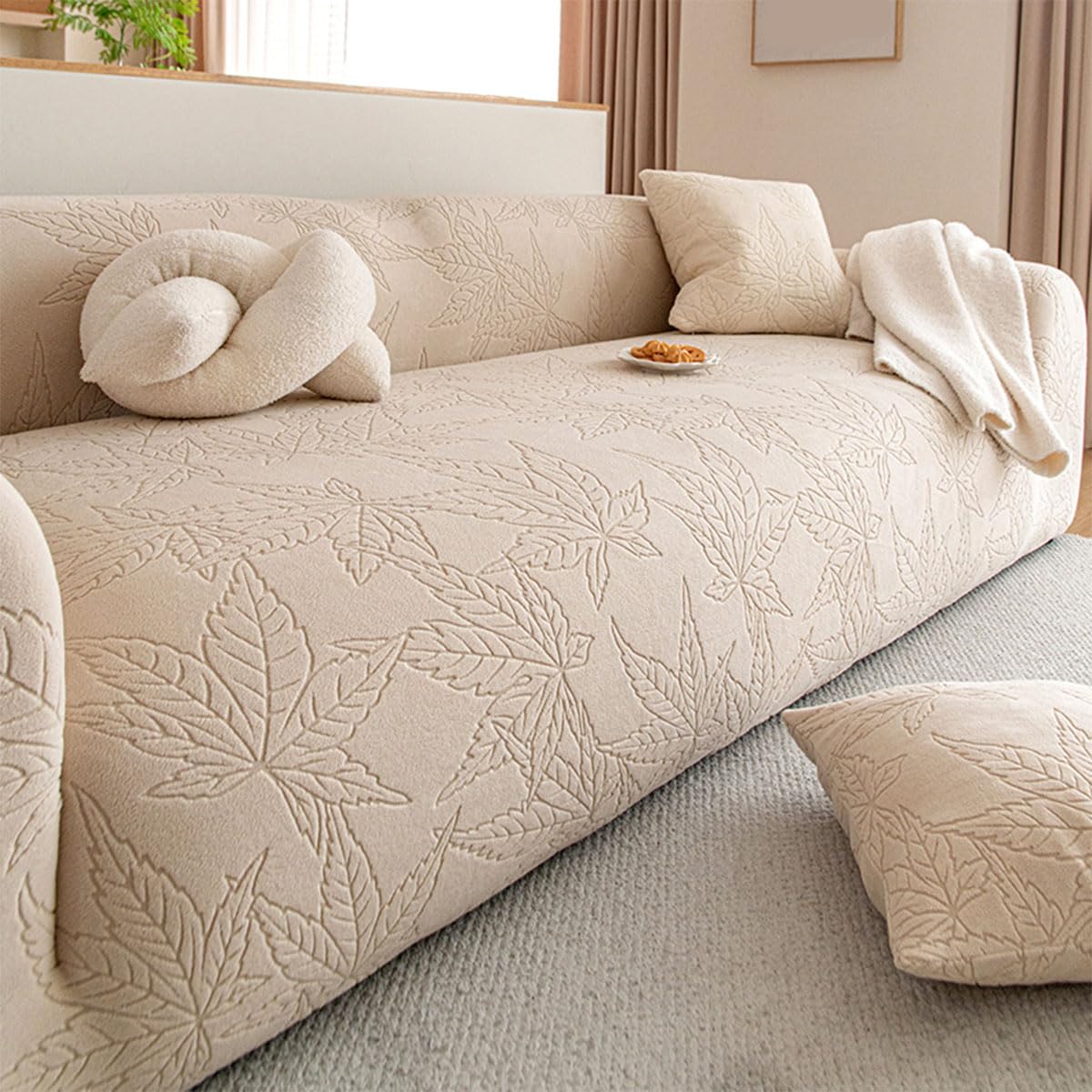 Housse de canapé extensible pour protéger un meuble 3 places usé