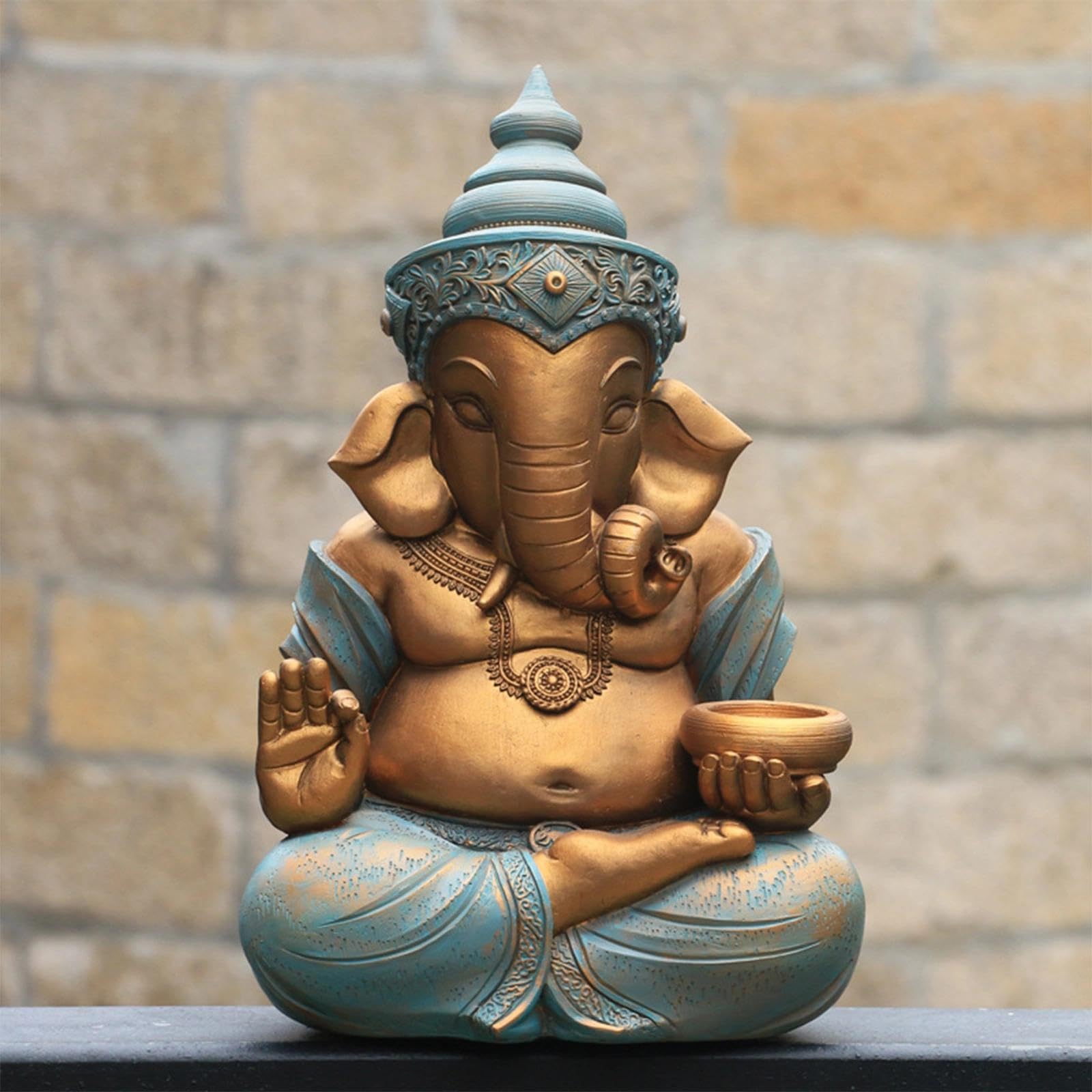 Figurka Ganesha z żywicy z świecznikiem, 32 cm, figurka religijna - ręcznie malowana indyjska dekoracja jako dekoracja stołu i medytacji, figurka boga słonia