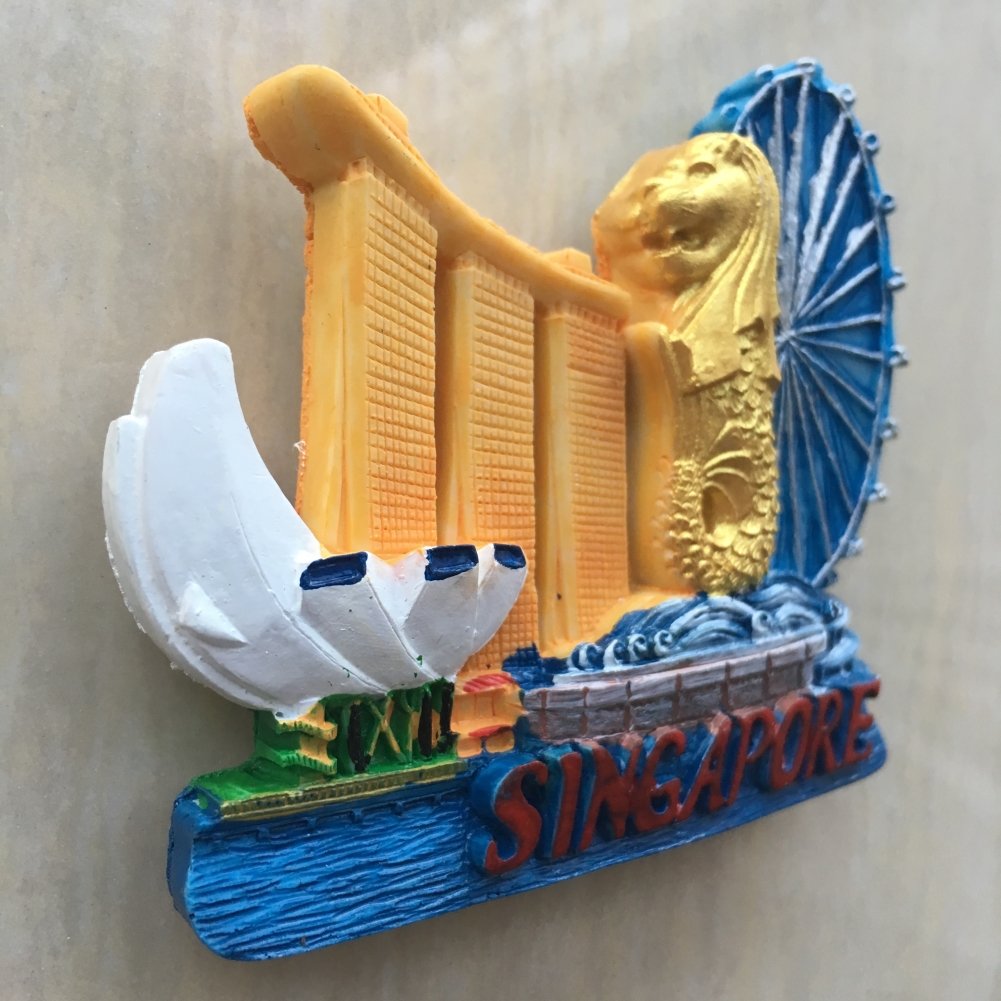 Merlion and Marina Bay Sands in Singapore on Sunset Editorial