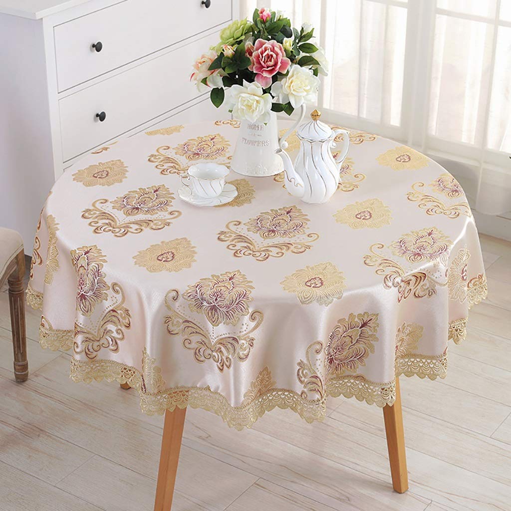Grande nappe de table ronde en tissu jacquard pour sublimer les repas de famille au salon
