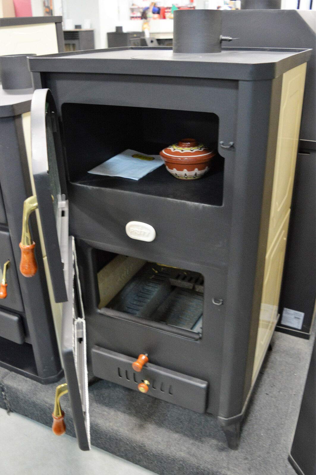 Piec opalany drewnem kocioł piekarnik kuchenka z nogami i dekoracyjnymi malowanymi bokami 23 kW Prity FG18R