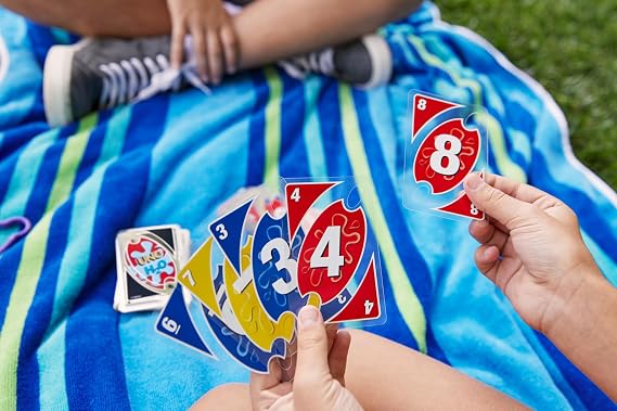 Mattel Games UNO H2O to Go Water resistant cards 2-10 players Ages 7+ | Cards game, to take to the beach or pool, handy clip, travel essential, P1703