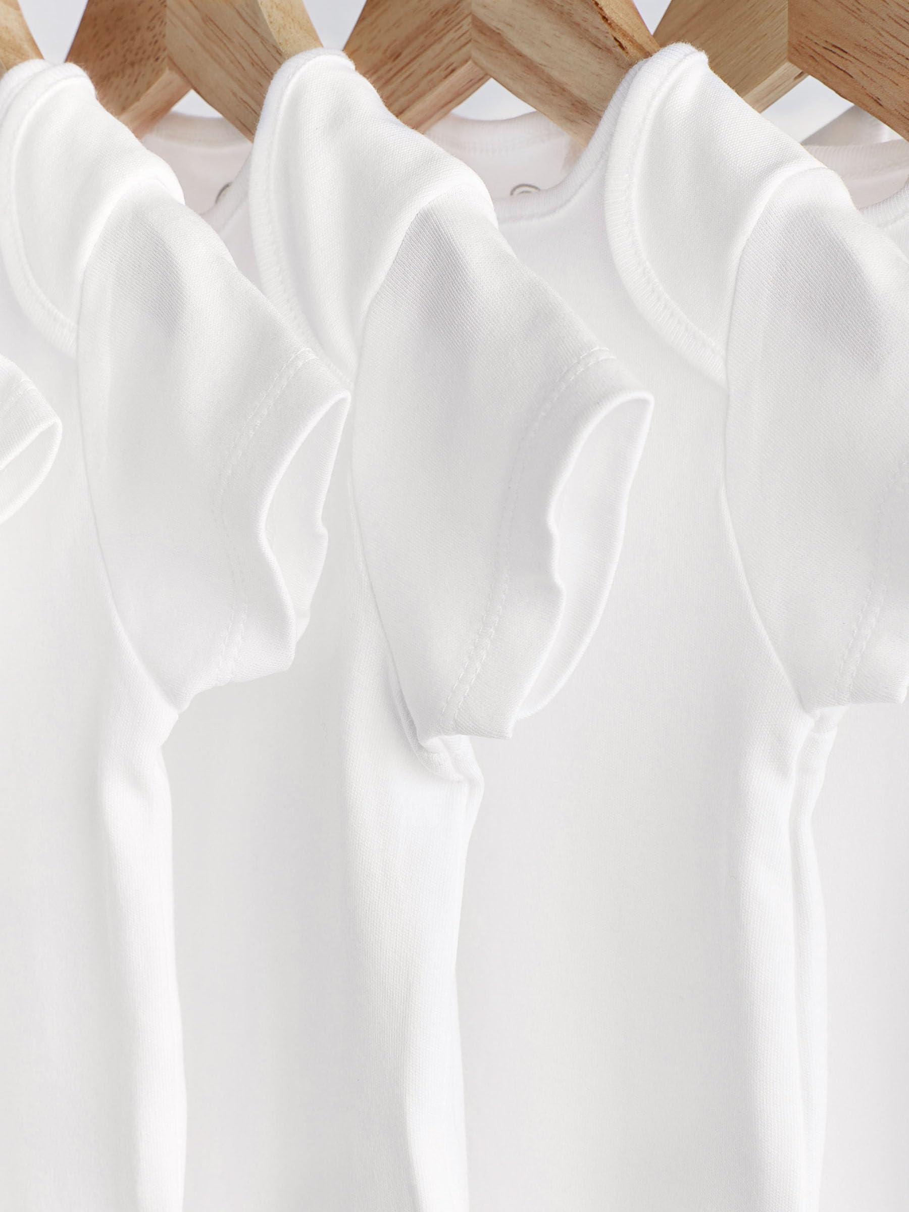 NEXT Noworodki unisex Zestaw 7 niemowlęcych body z krótkim rękawem