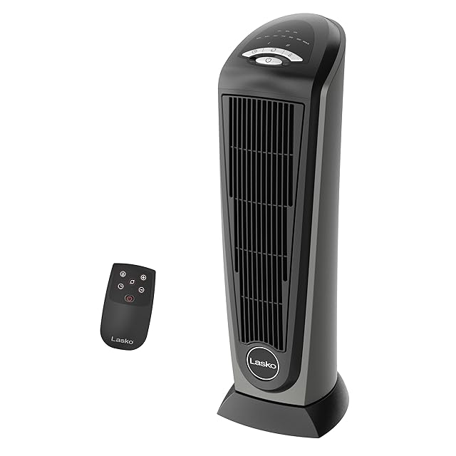 Lasko 5586 1500W ceramic tower space heater in black slim vertical form factor with digital control panel on top displaying temperature and timer, remote control resting beside it, oscillating widely across a long living room with bay windows visible behind — the largest review base of any heater in our research pool at 40,259 Amazon reviews