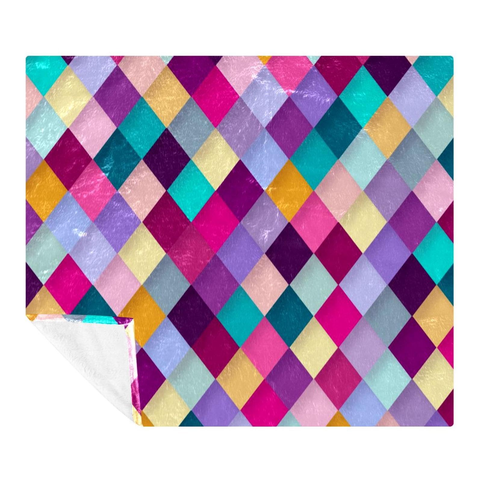Couverture polaire légère motif diamant pour vos soirées cocooning sur le canapé