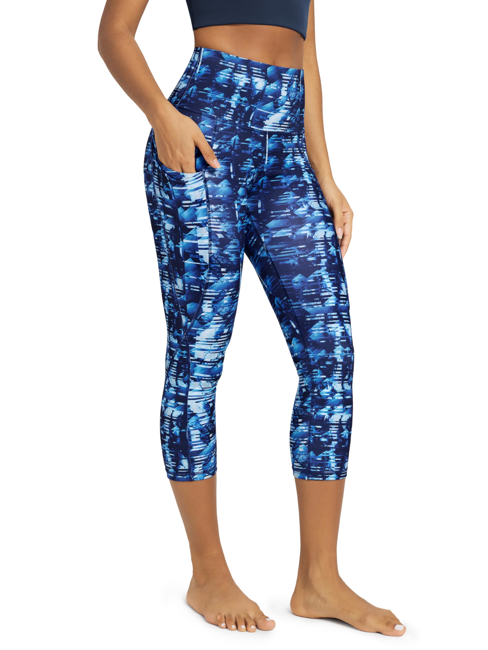 ODODOS Women's High Waisted Yoga Capris with Pockets, Tummy Control Non See Through Workout Athletic Running Capri Leggings