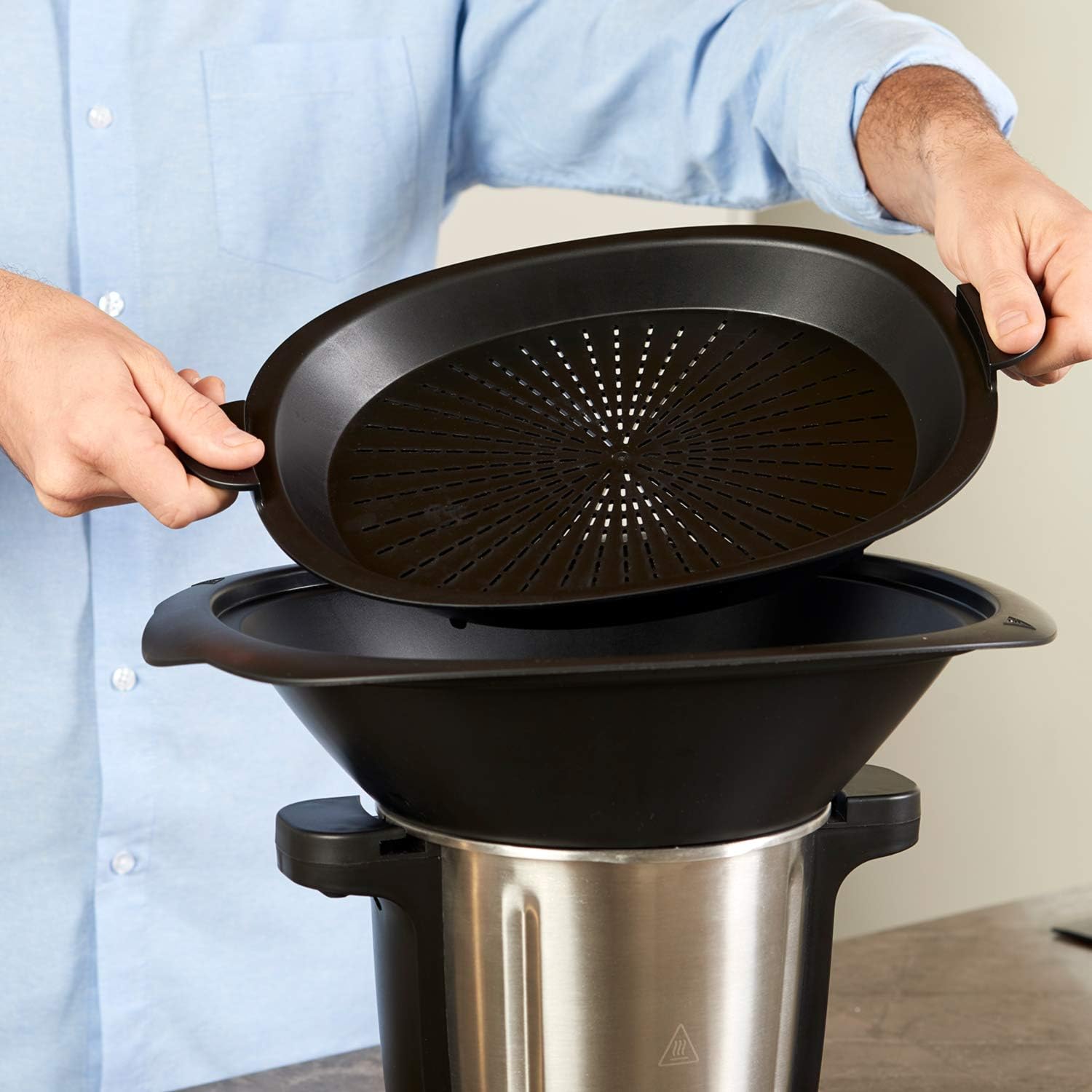 User adding ingredients to the Foodie food processor