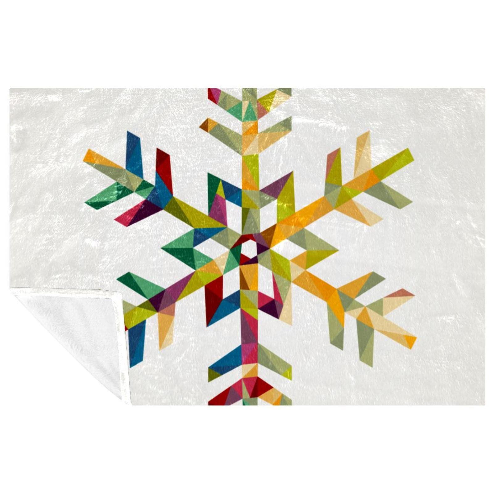 Plaid flocon de neige en triangles colorés pour sublimer vos soirées canapé et pique-niques