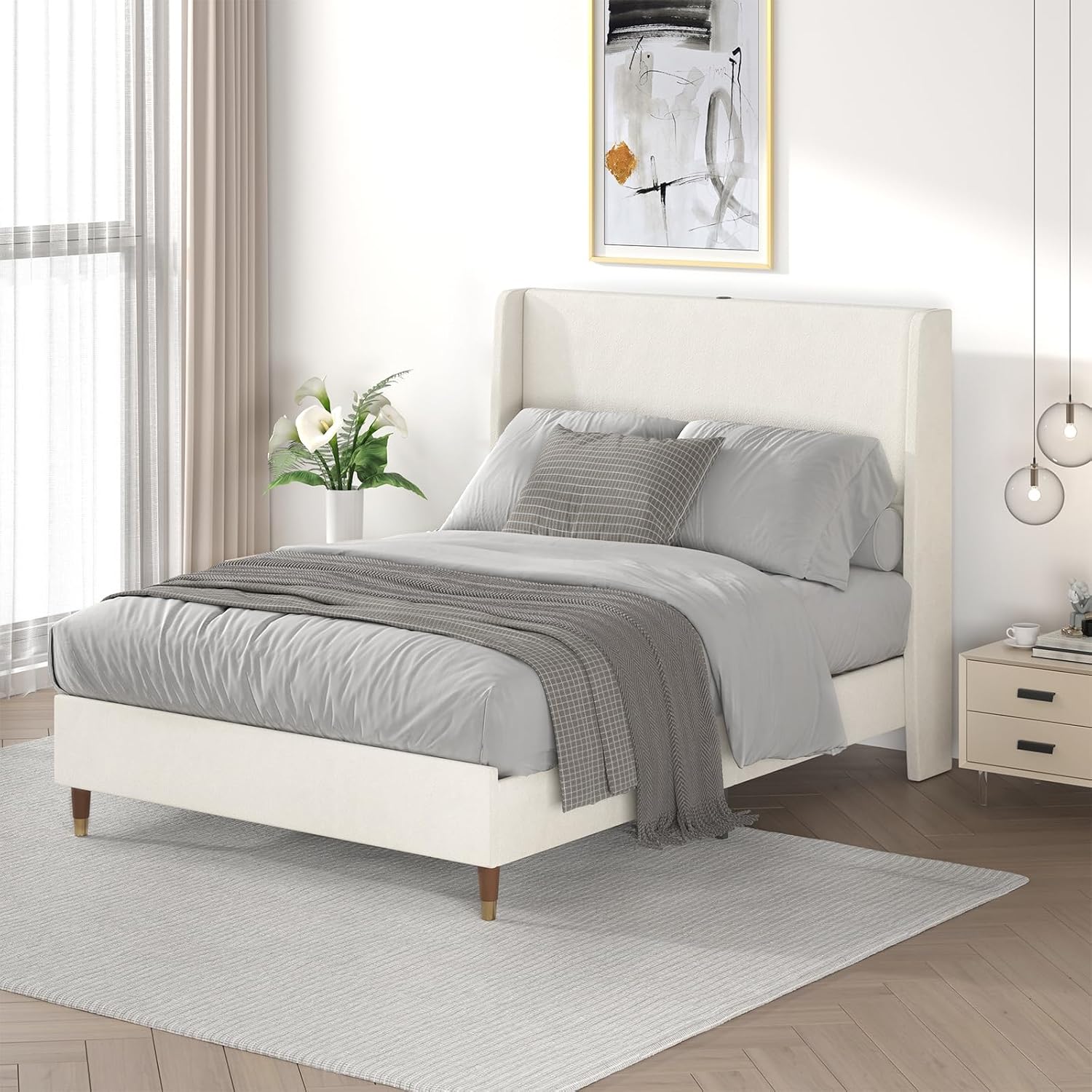 Upholstered beige platform bed in organic modern bedroom