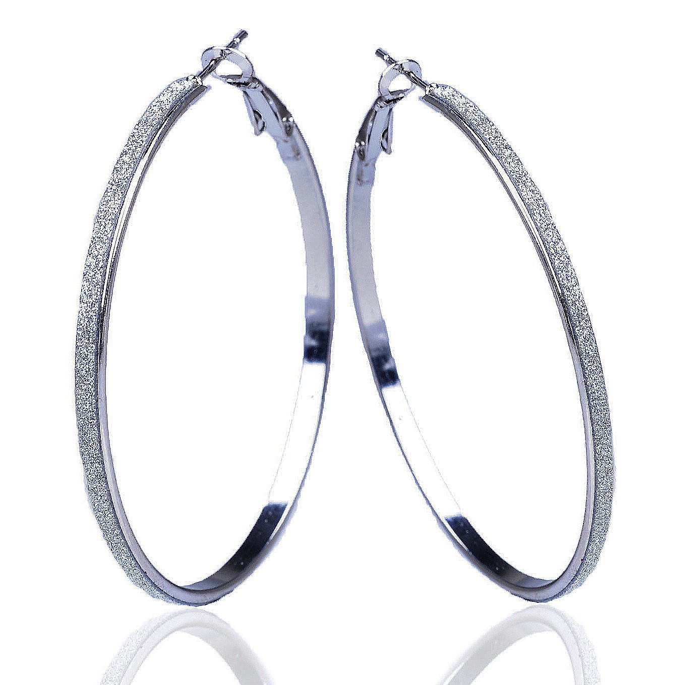 Woman wearing Gemini Sterling Silver Hoop Earrings