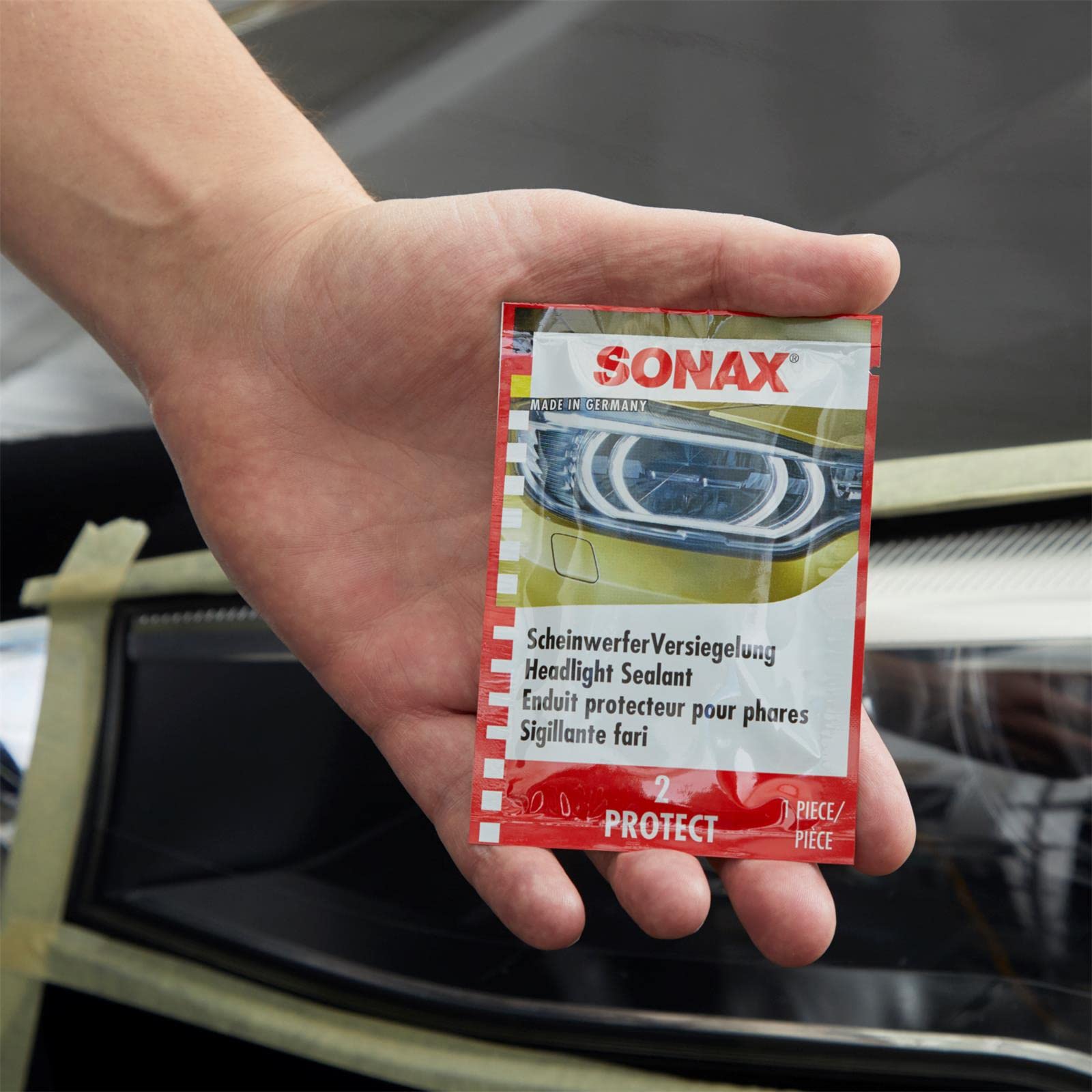 SONAX 04059410 - Set di pulizia e cura fanali, 89 ml